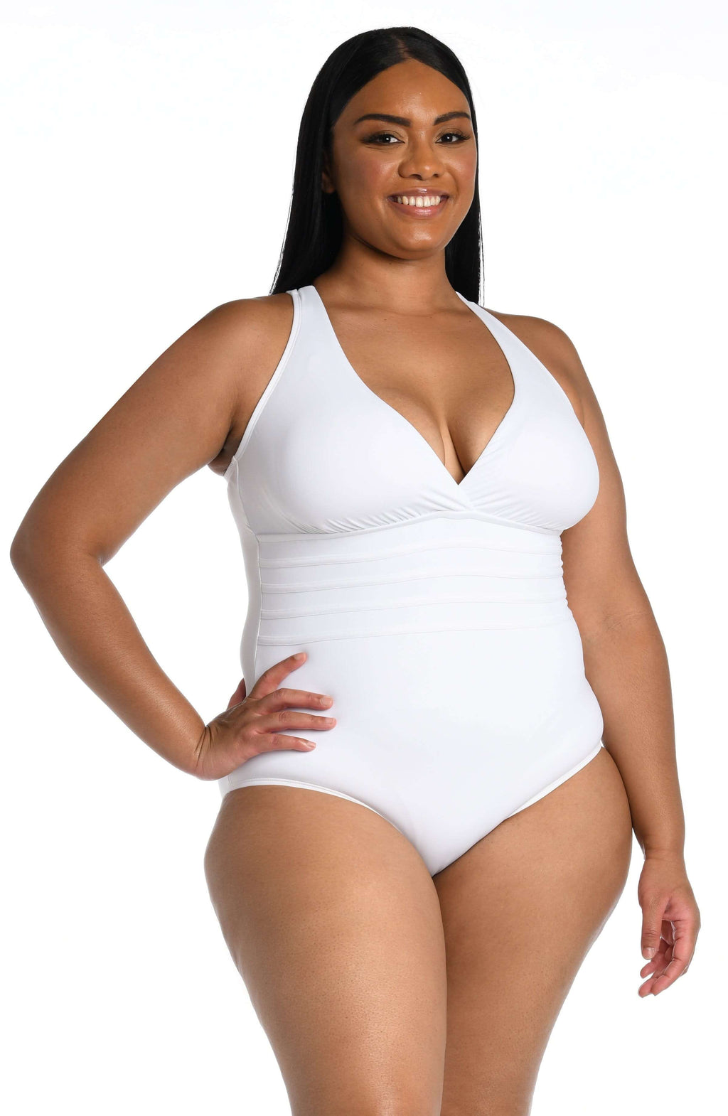 Woman wearing a white swimsuit on a white background