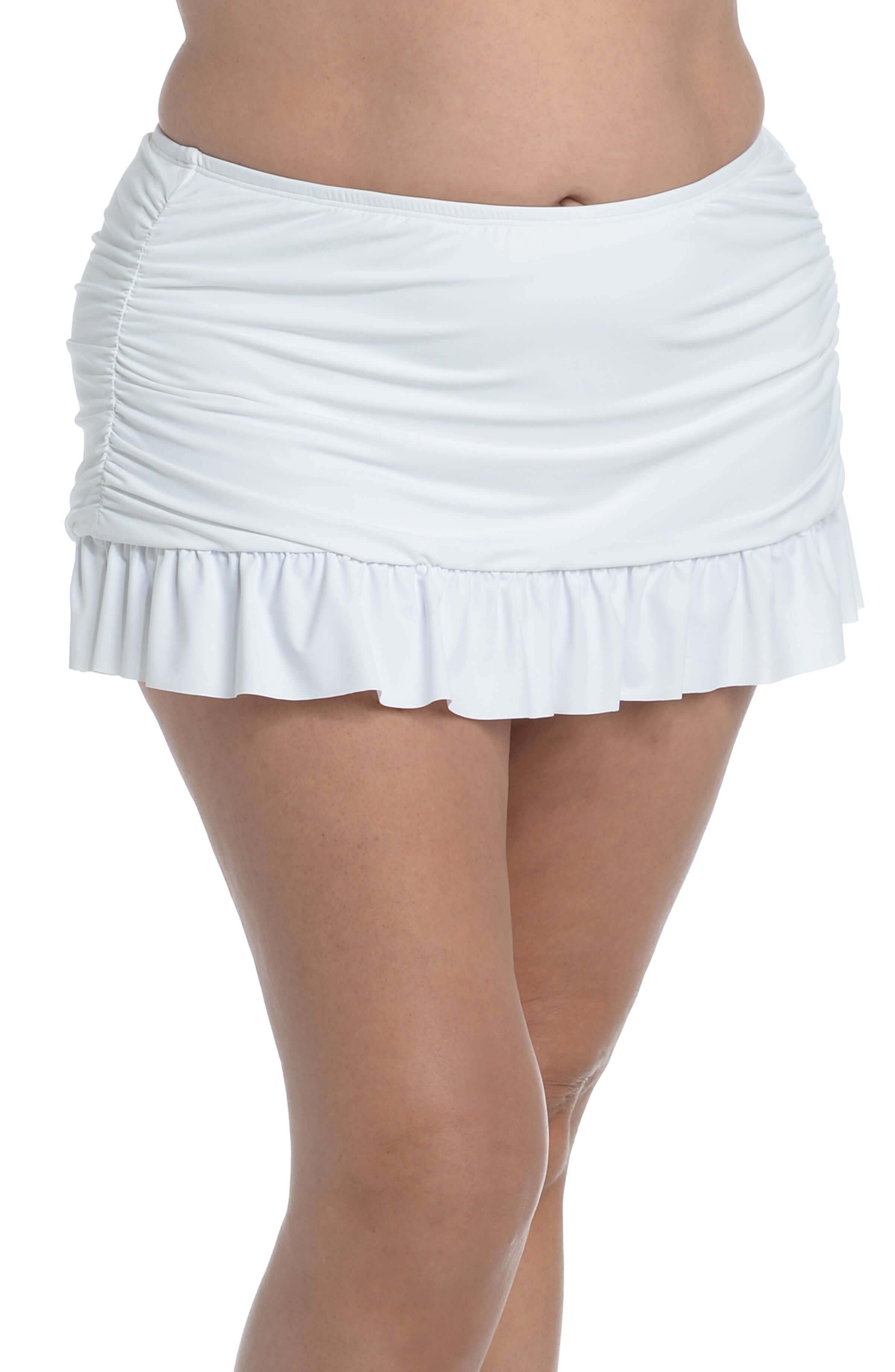 White ruffled swim skirt worn by a person on a white background