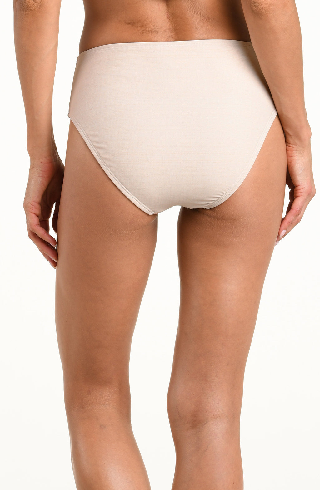 Woman wearing a multicolored white high waisted bikini bottom against a white background. 