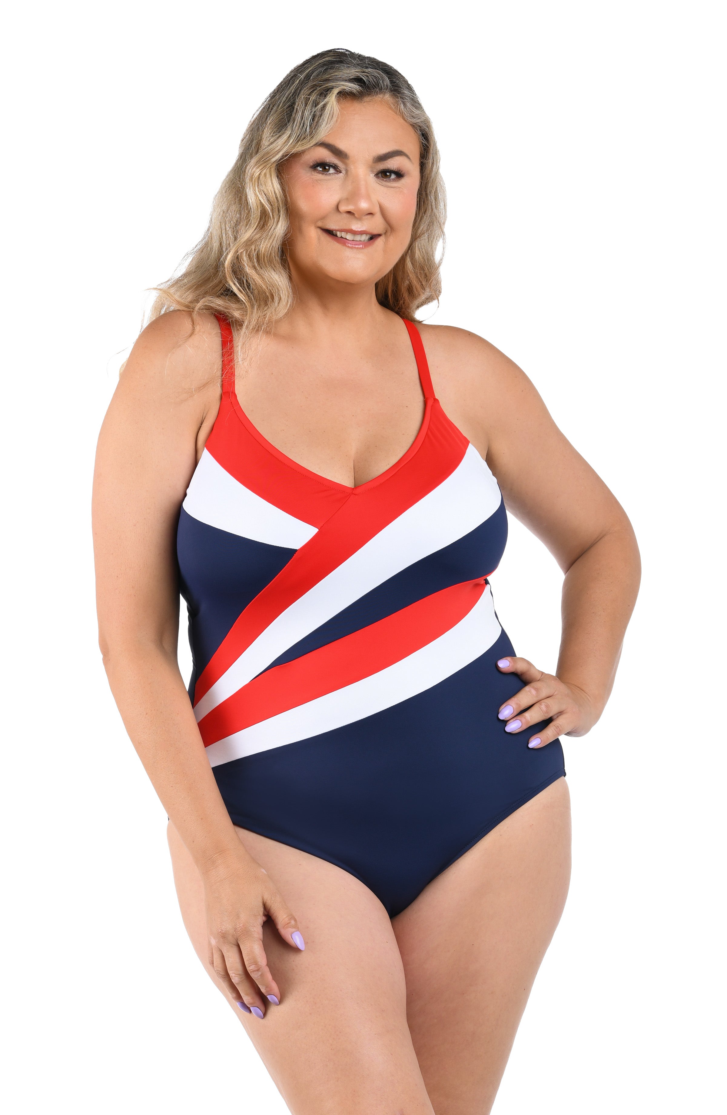 Woman wearing a red, white, and blue one piece swimsuit against a white background.