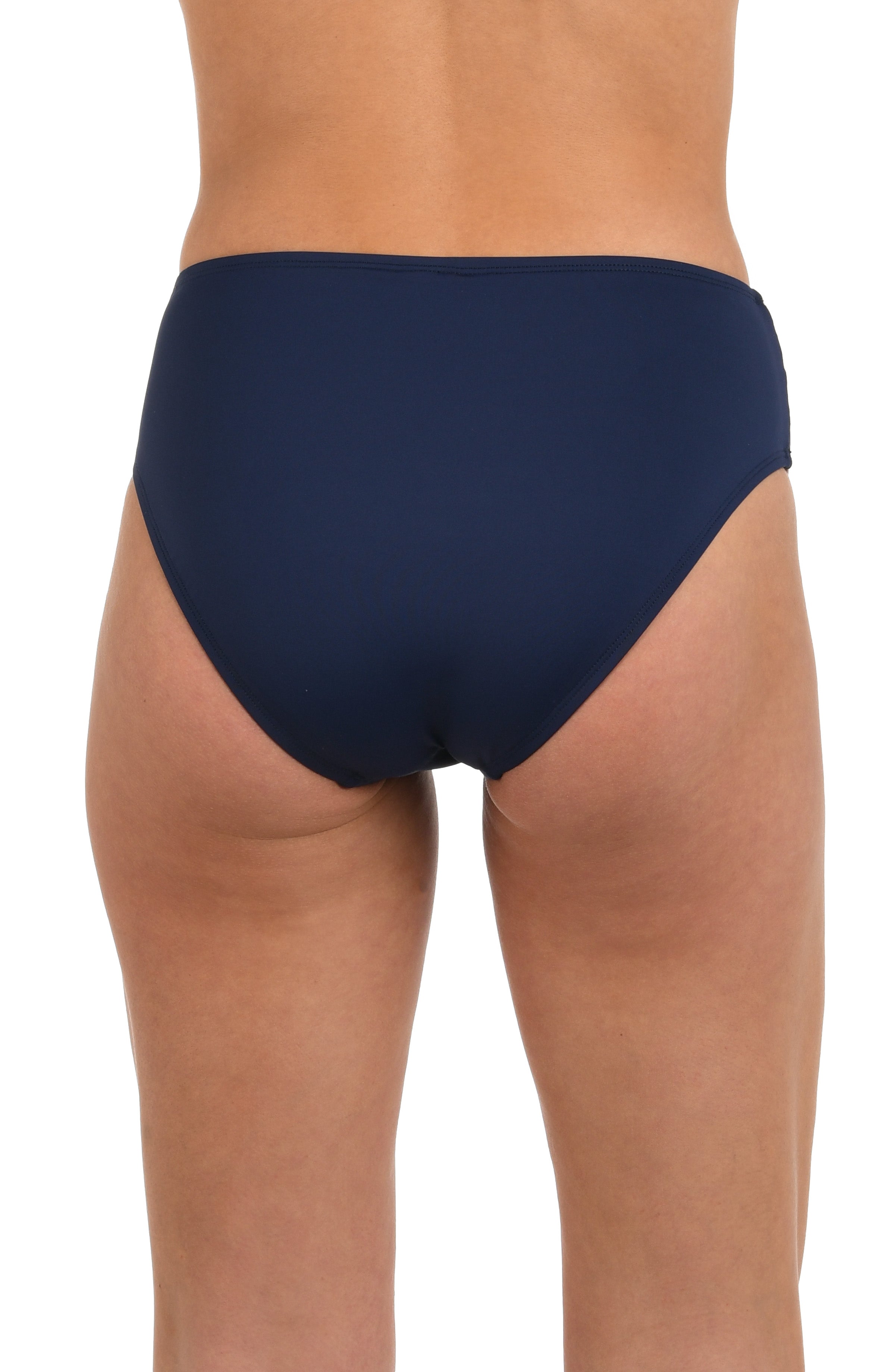 Woman wearing a red, white, and blue mid-waist bikini bottom against a white background.