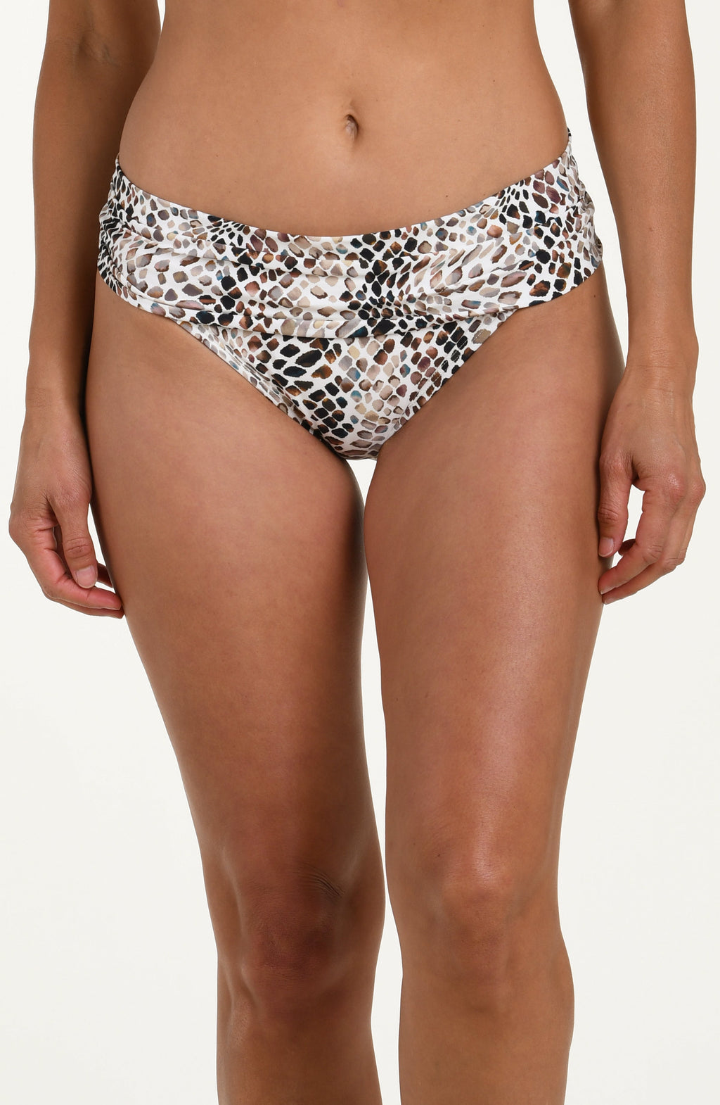 Animal print bikini bottom worn by a person on a white background