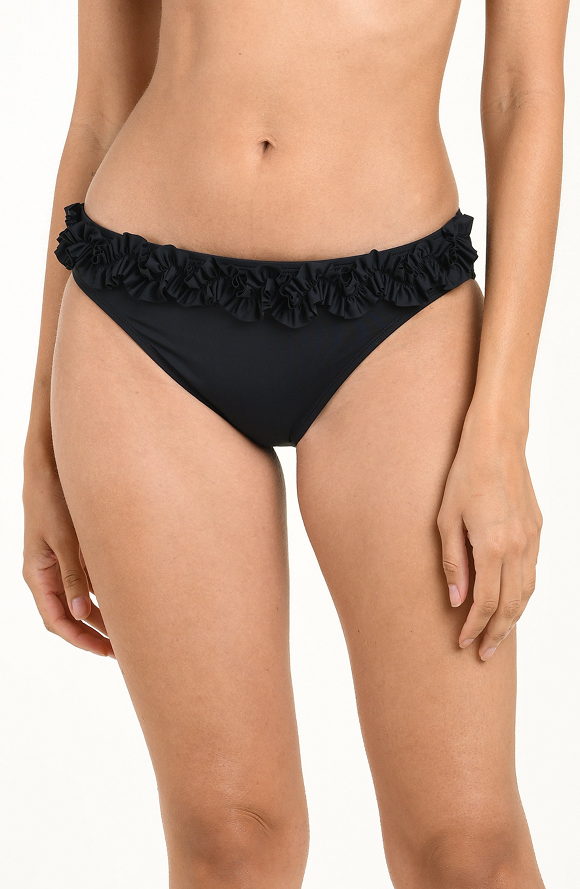 Black bikini bottom with ruffled details on a white background