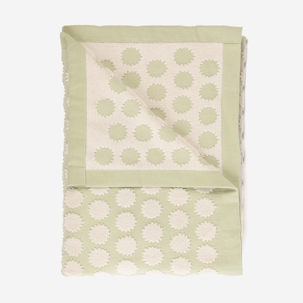 Light green beach towel with design by Layday