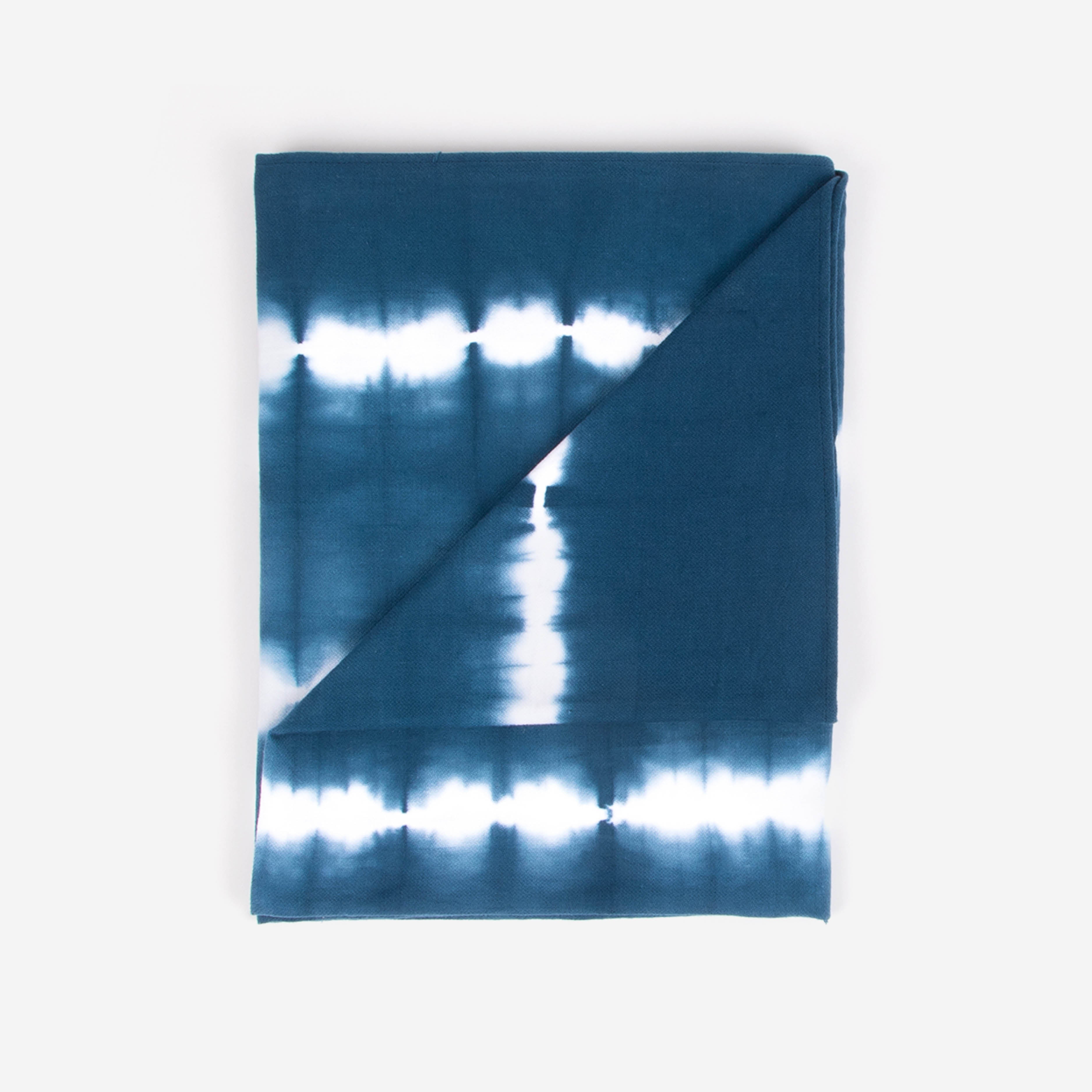 Teal colored beach towel by Layday.