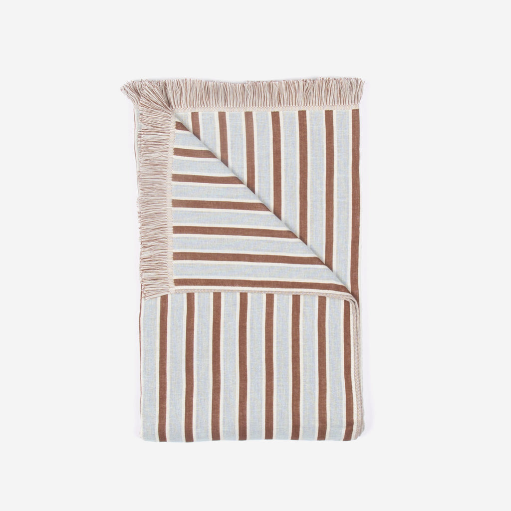 Brown and beige striped beach towel by Layday.