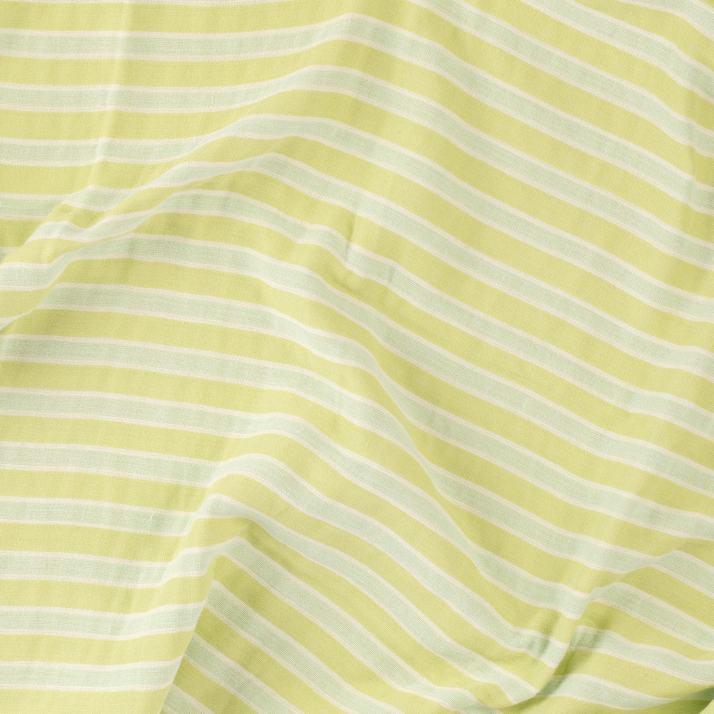Close-up of a mint green and white striped beach towel by Layday.