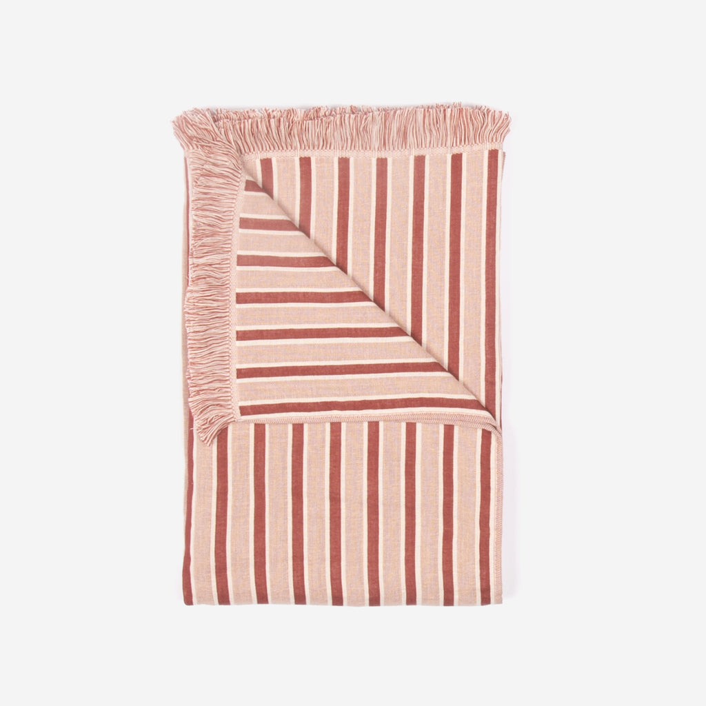 Red and beige striped beach towel by Layday.