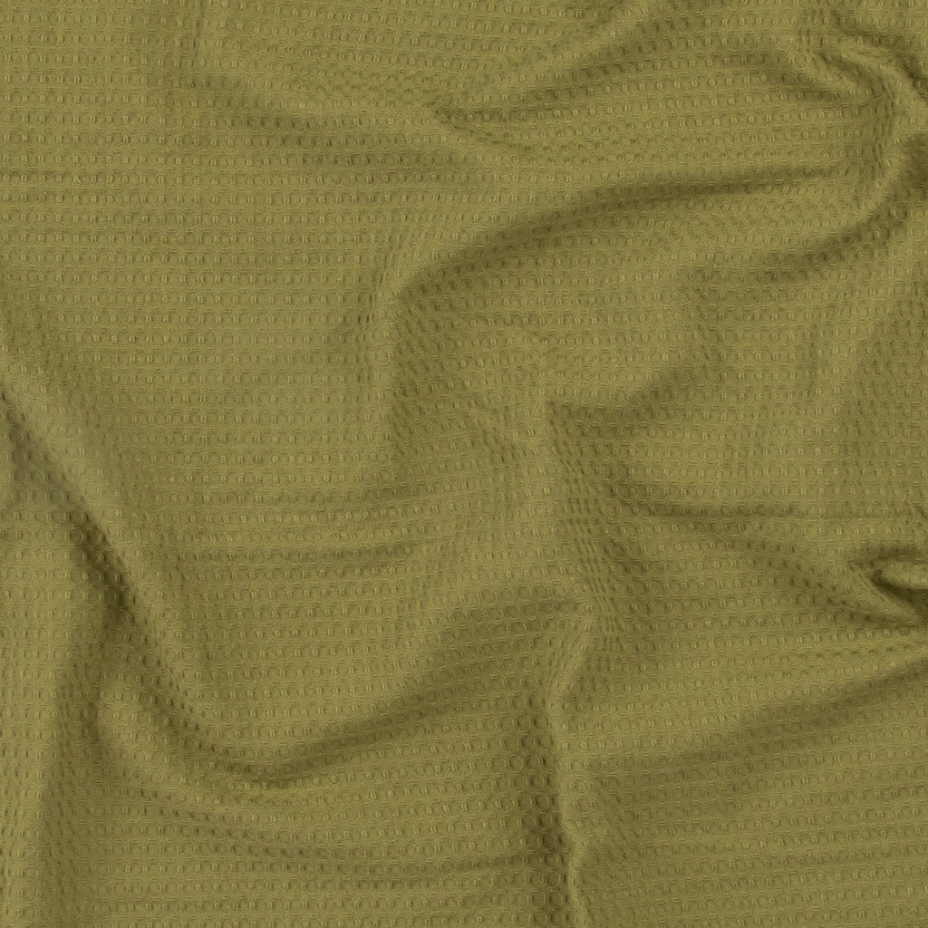 Close-up of an olive green colored beach towel by Layday