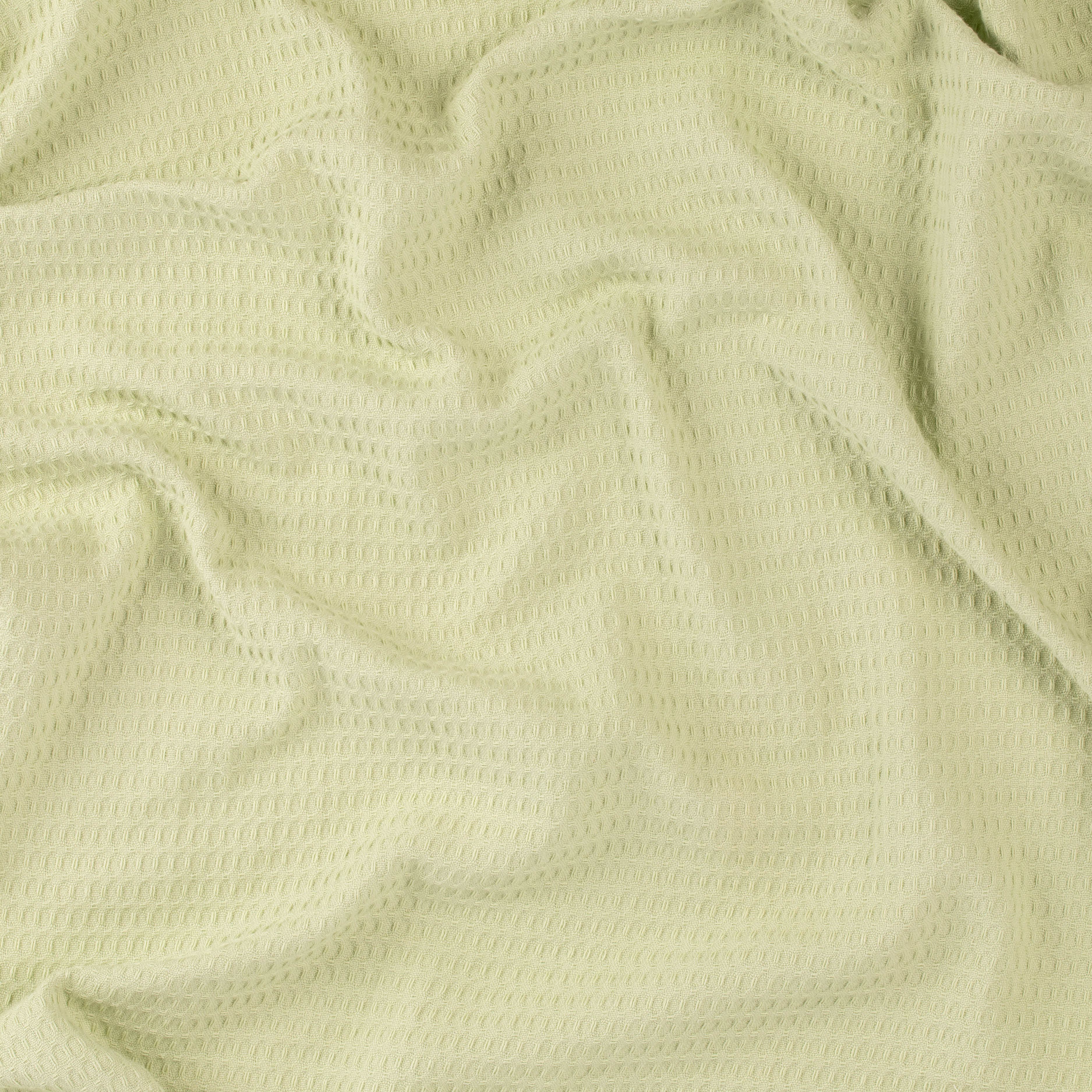 Close-up of a Sage colored beach towel by Layday