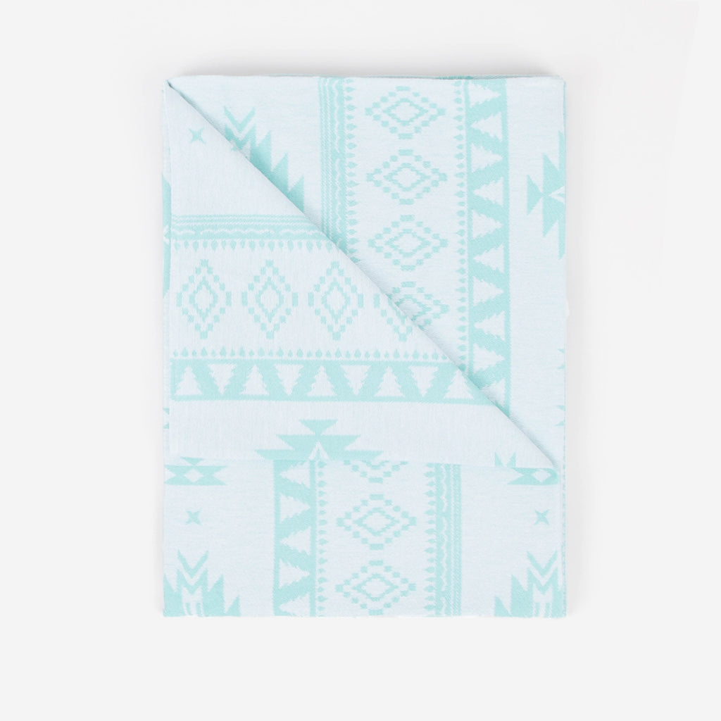 Light blue patterned fabric on a white background