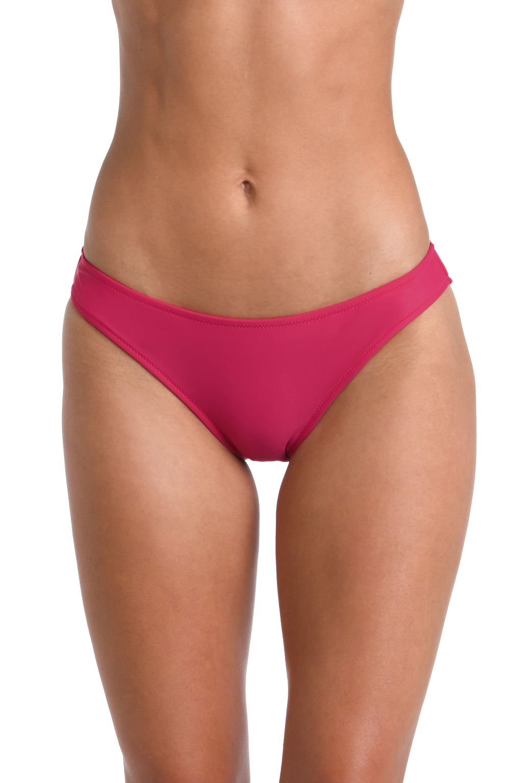 A close-up of a model's lower torso wearing a bright pink bikini bottom against a plain white background.