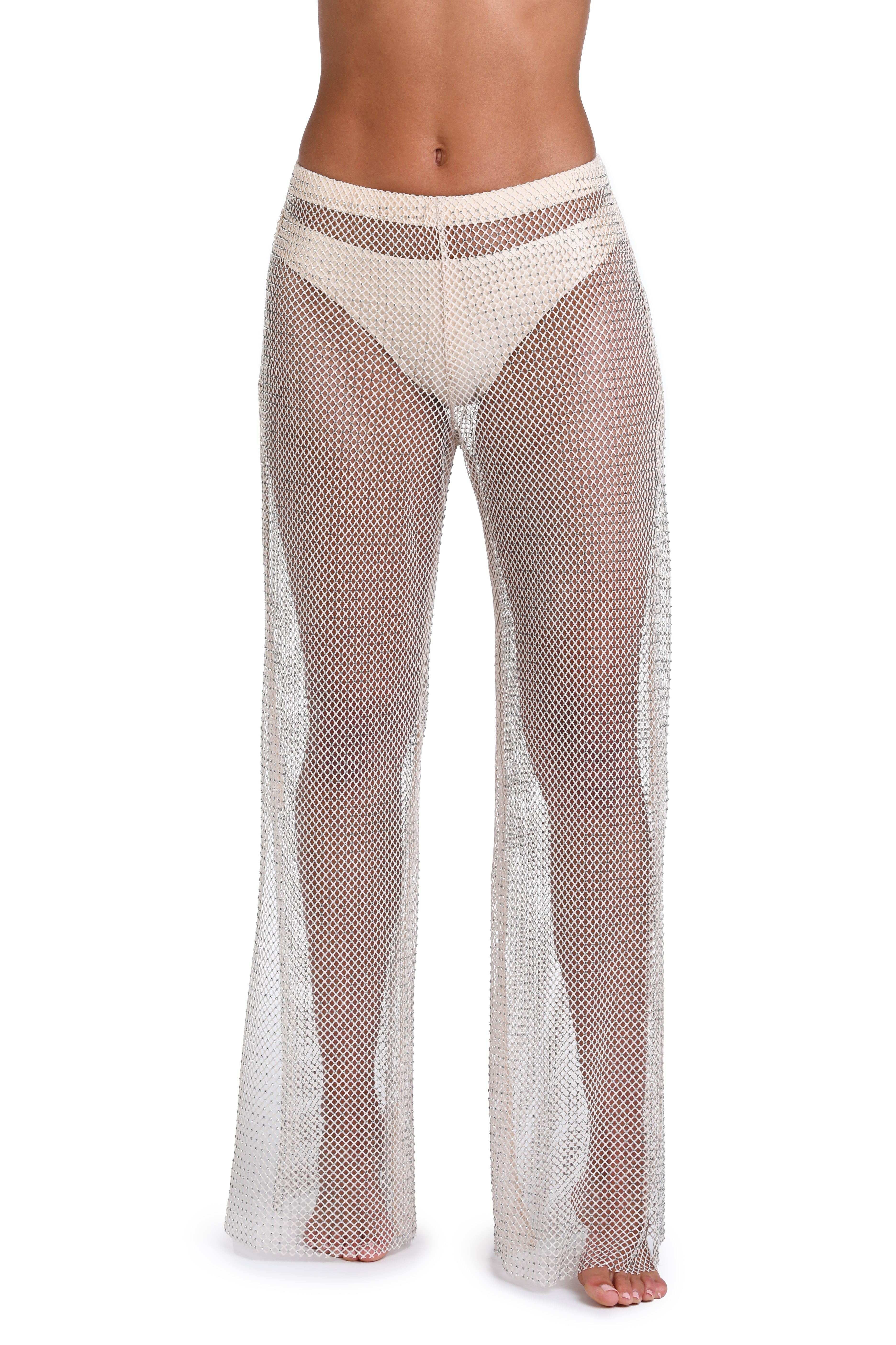 A model is shown from the waist down wearing a sheer, off-white mesh wide-leg panty with a matching thong-style front panel, set against a plain white background.