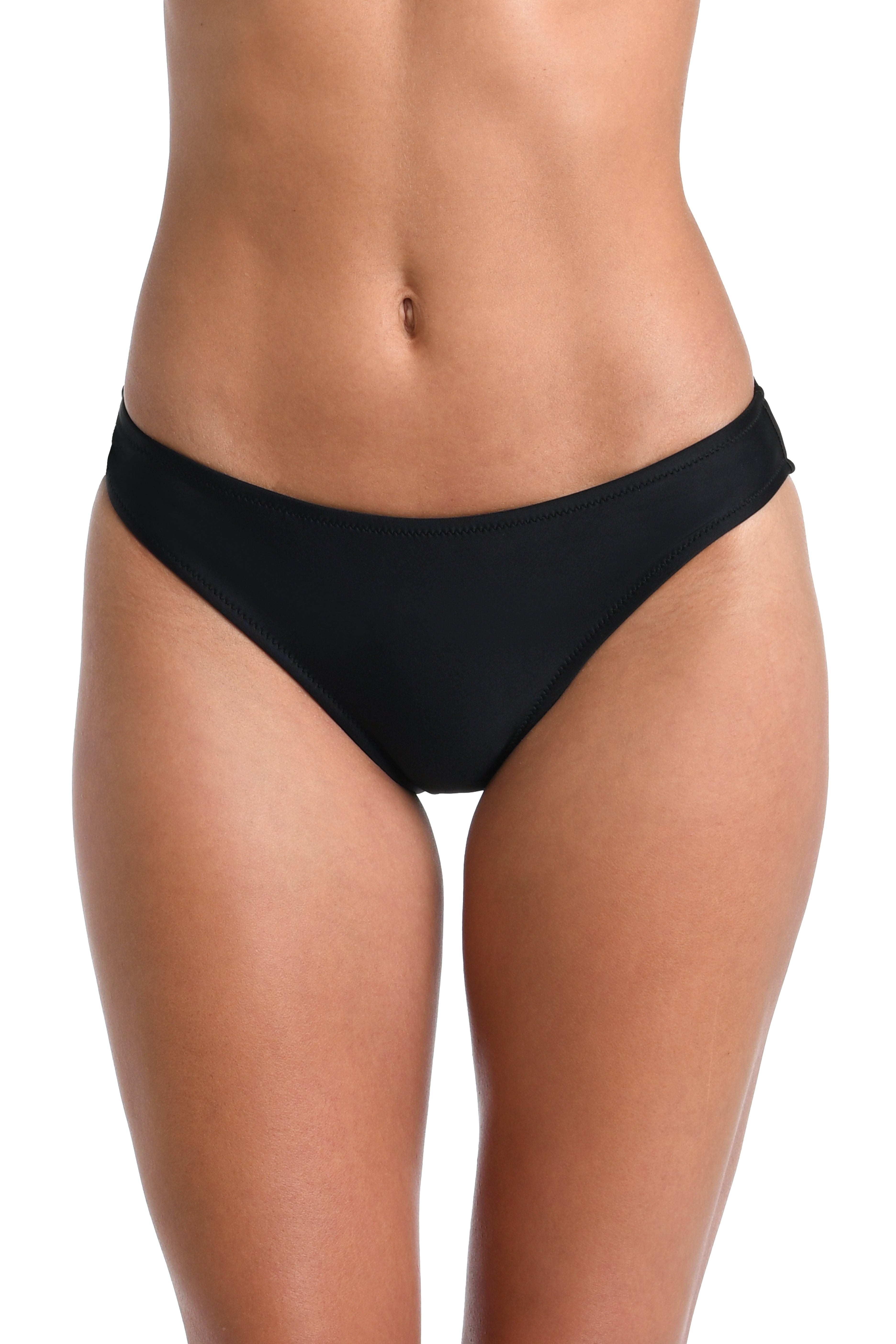 Black bikini bottom worn by a person on a white background