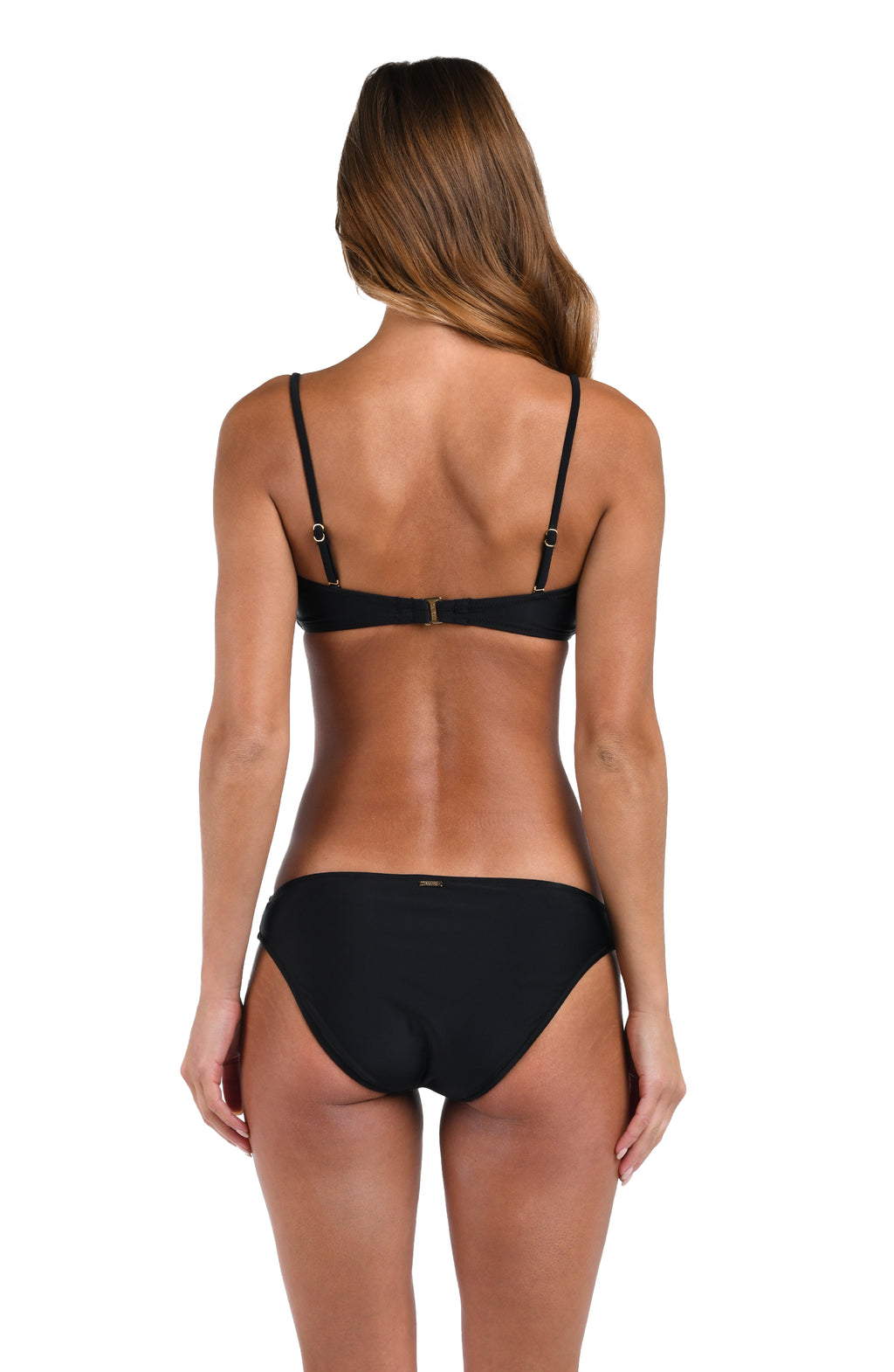 Black bikini worn by a model on a white background