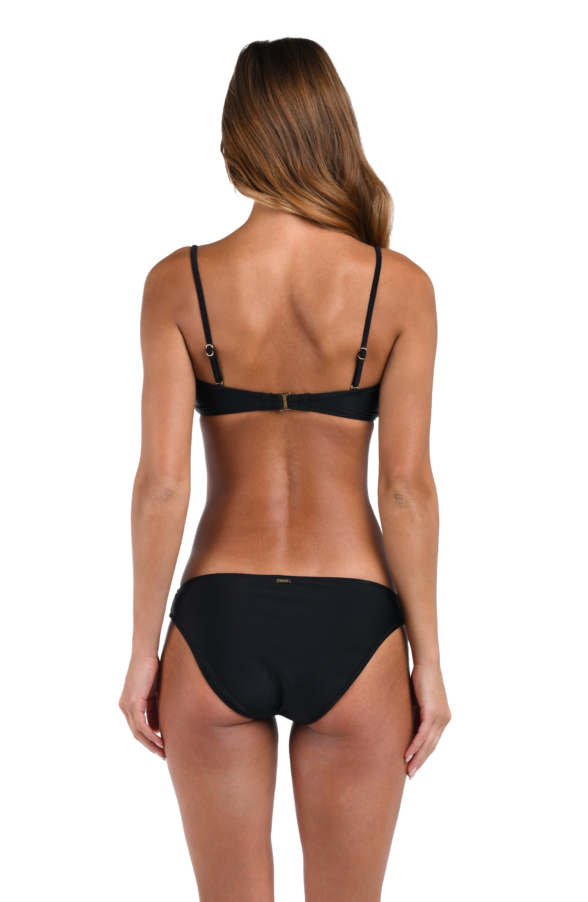 Black bikini worn by a model on a white background