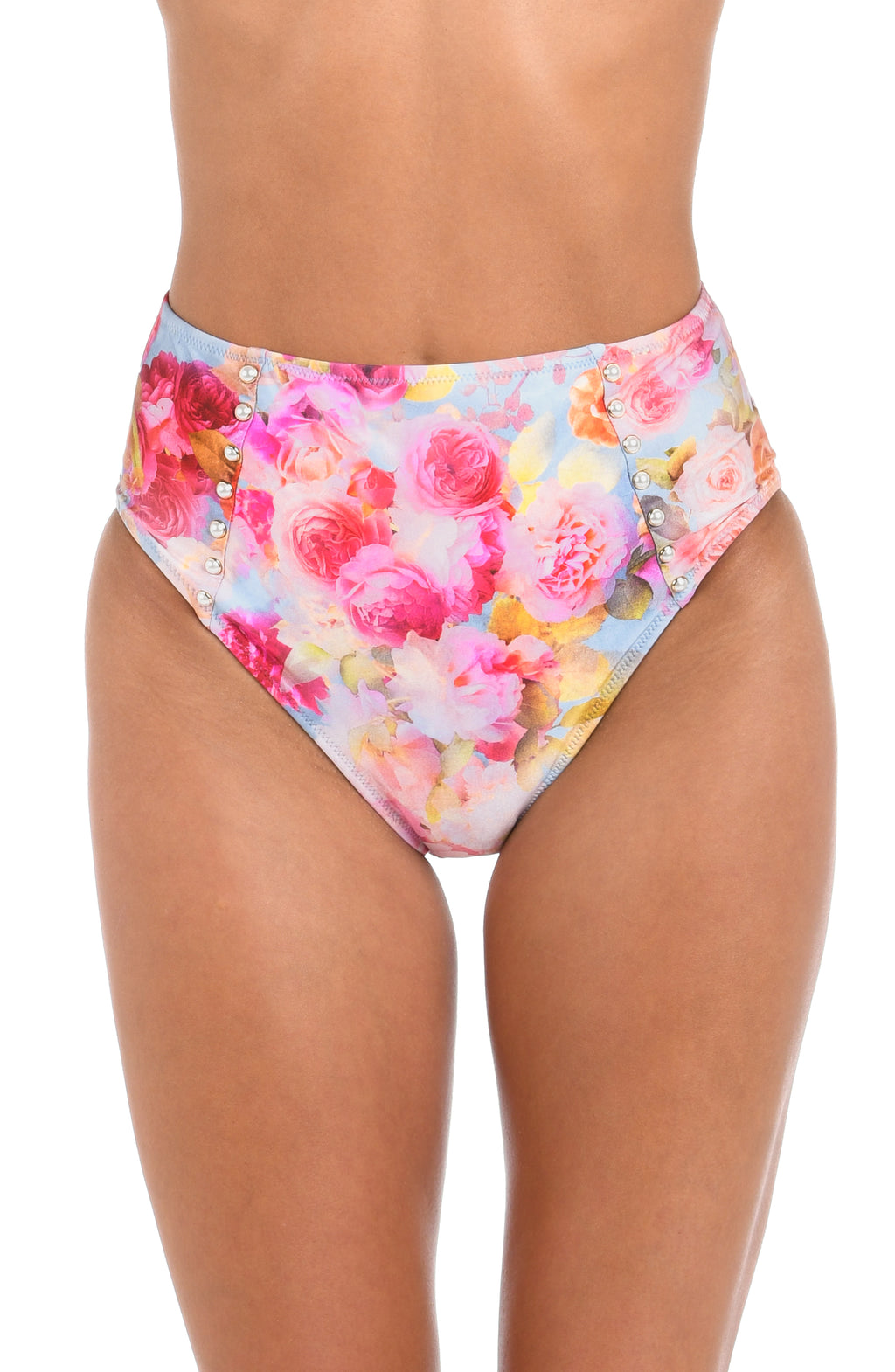 Woman wearing a light multicolored floral printed high waisted bikini bottom against a white background. 