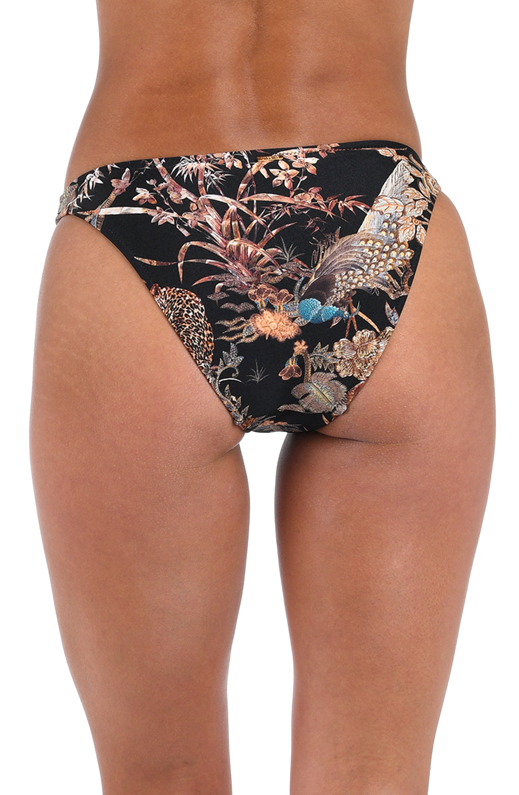 Woman wearing a black multicolored bikini bottom against a white background. 
