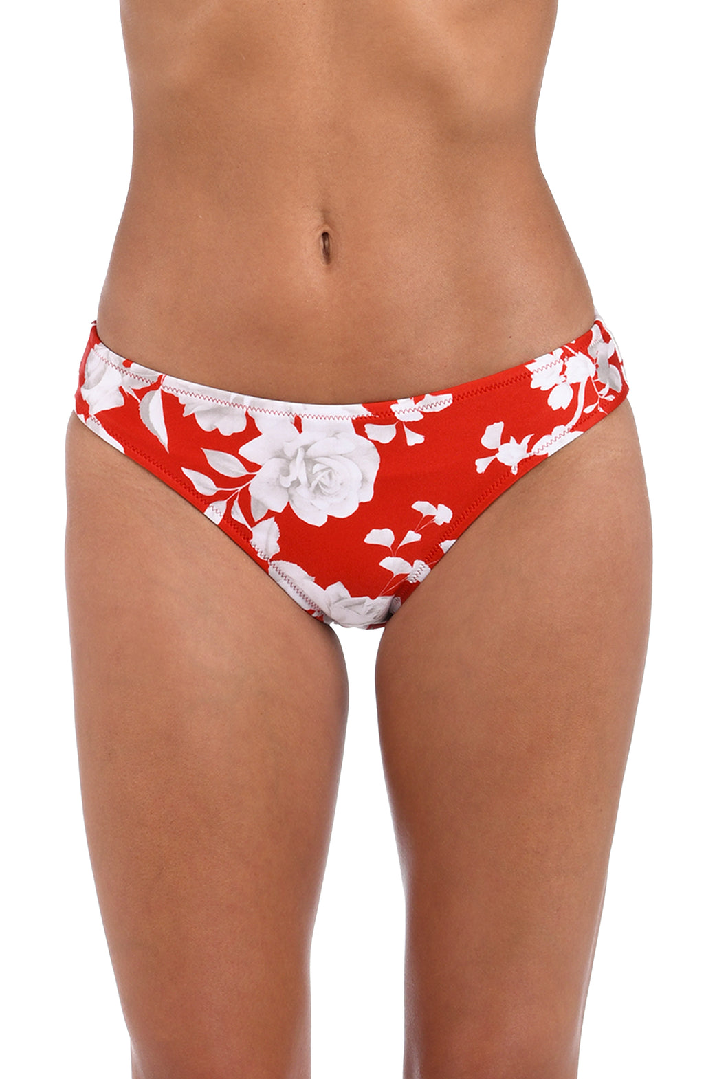 Woman wearing a red and white multicolored tropical printed hipster bikini bottom against a white background. 