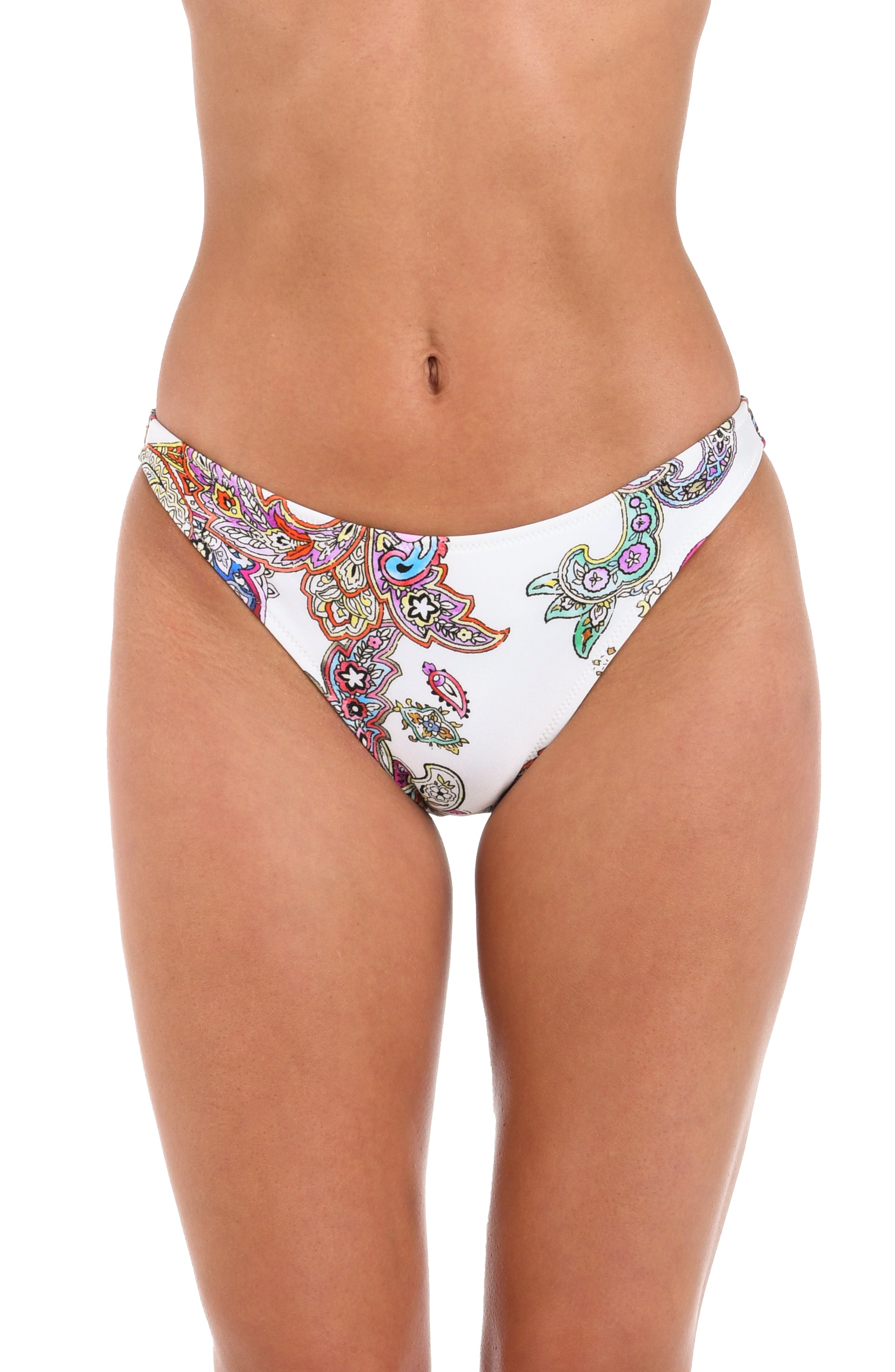 A woman wearing white bikini bottoms with a colorful paisley print, shown against a plain white background.