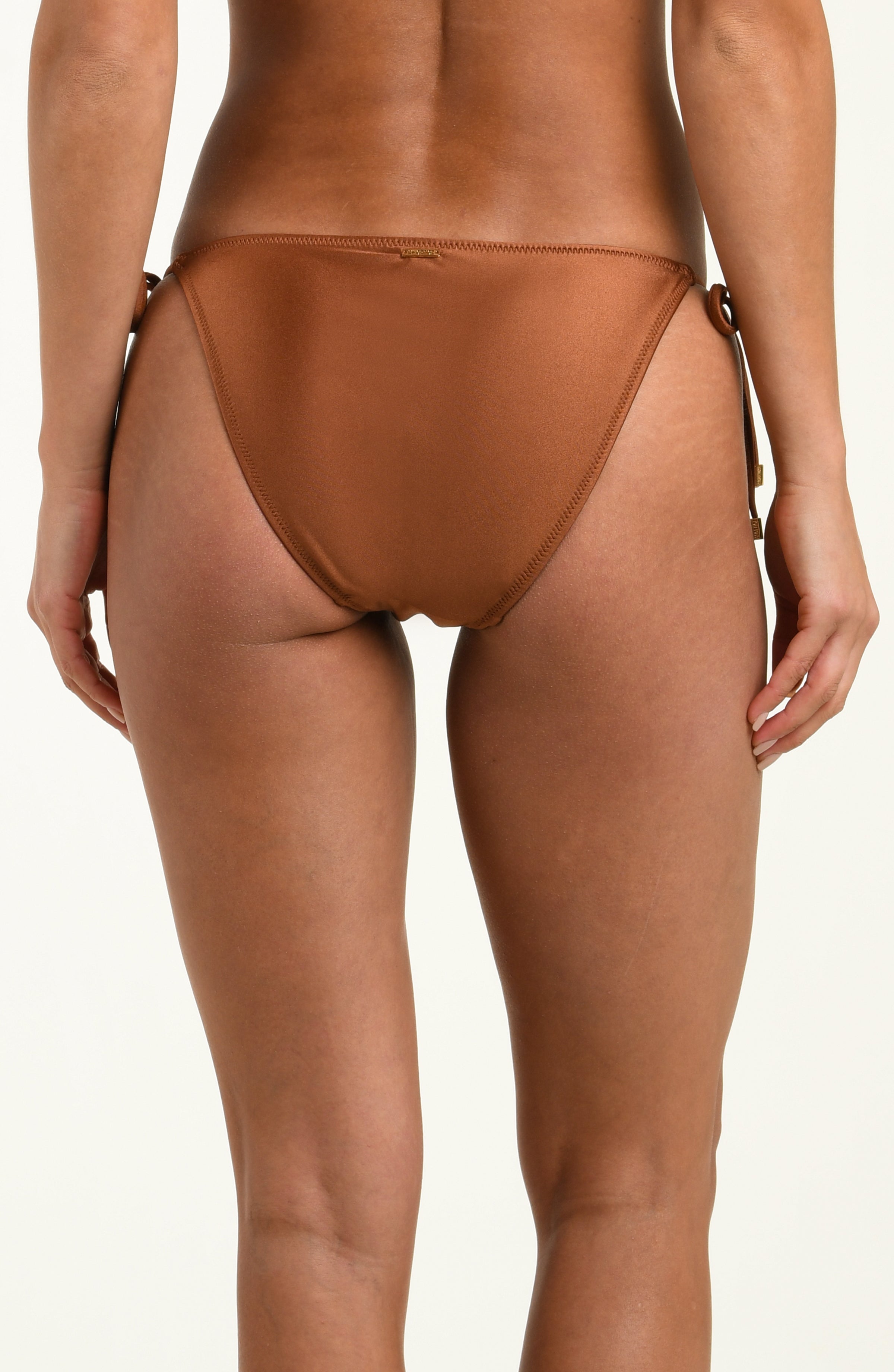 Brown bikini bottom on a white background