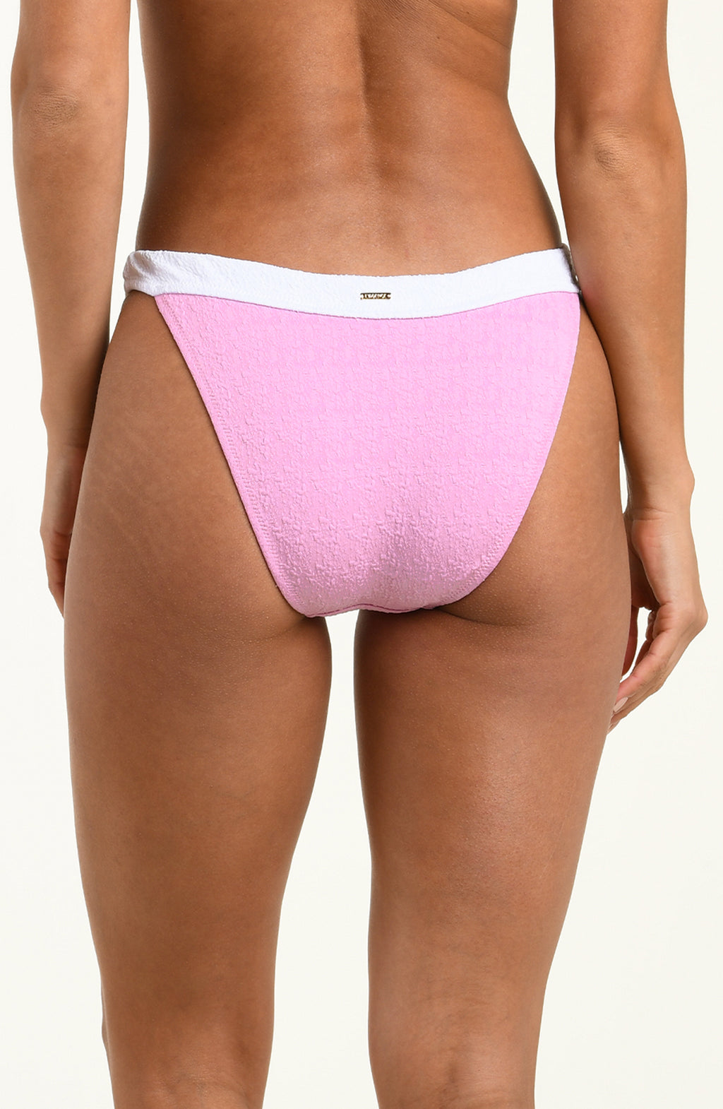 Pink bikini bottom with white waistband on a plain background