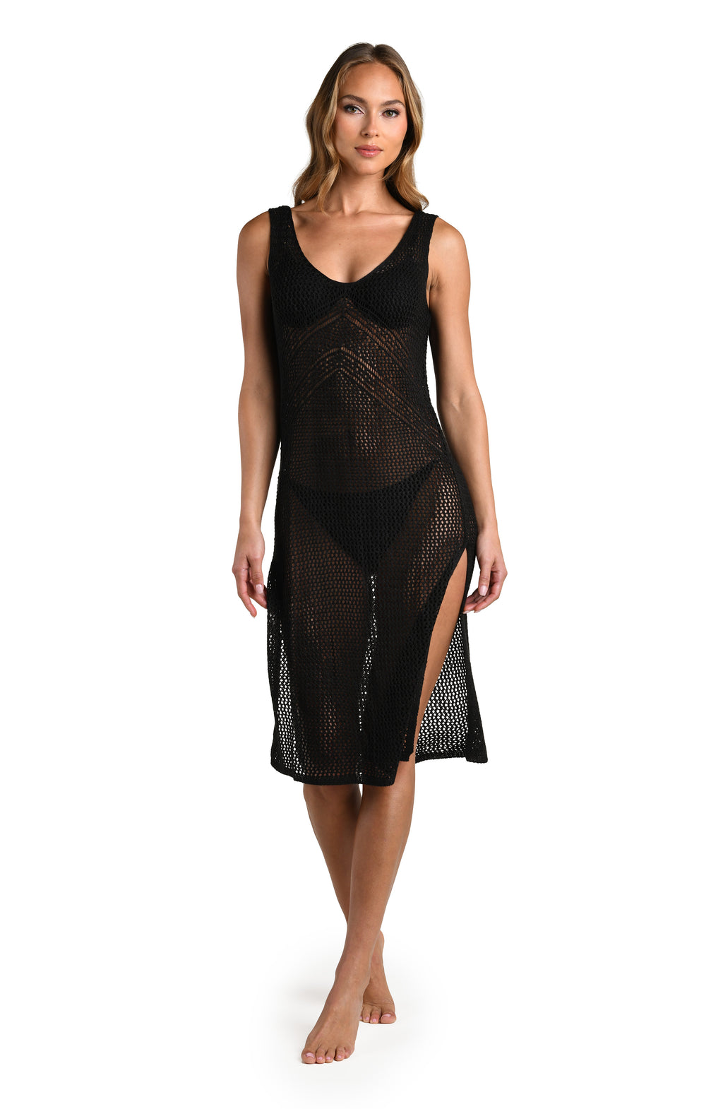 Woman wearing a solid black midi dress cover up against white background. 