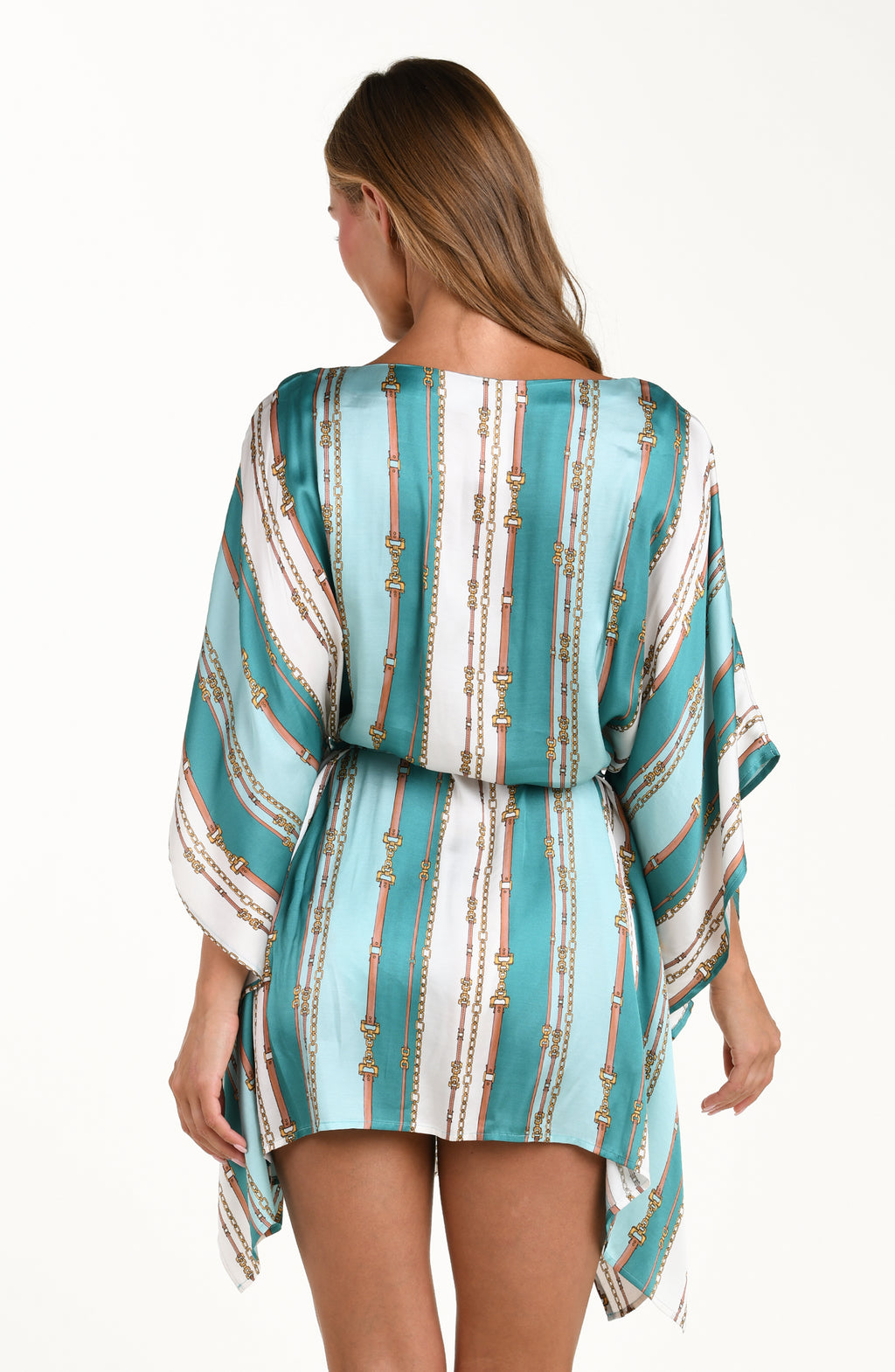 Back image of model wearing a belt-and-chain printed cover up tunic featuring a high neckline, wide sleeves, and removable belt. 
