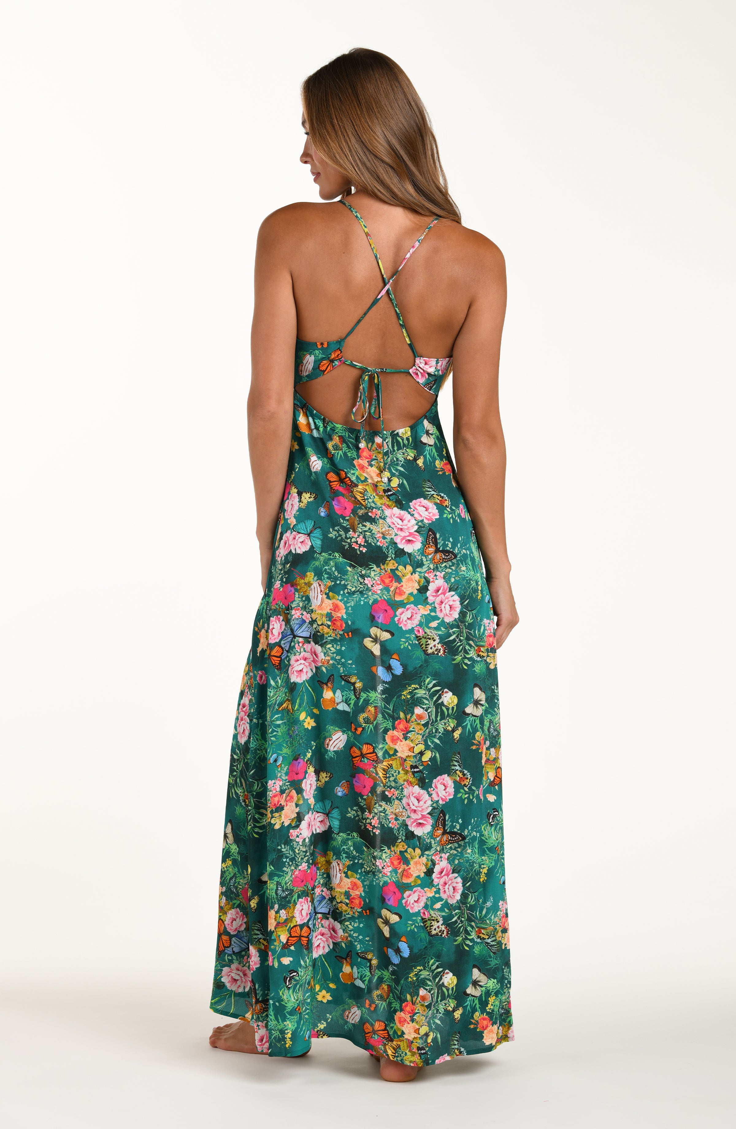 Full body back image of model wearing a cover-up dress offers a relaxed, flowy fit with lightweight, silky fabric and adjustable straps for effortless comfort and ease of movement.