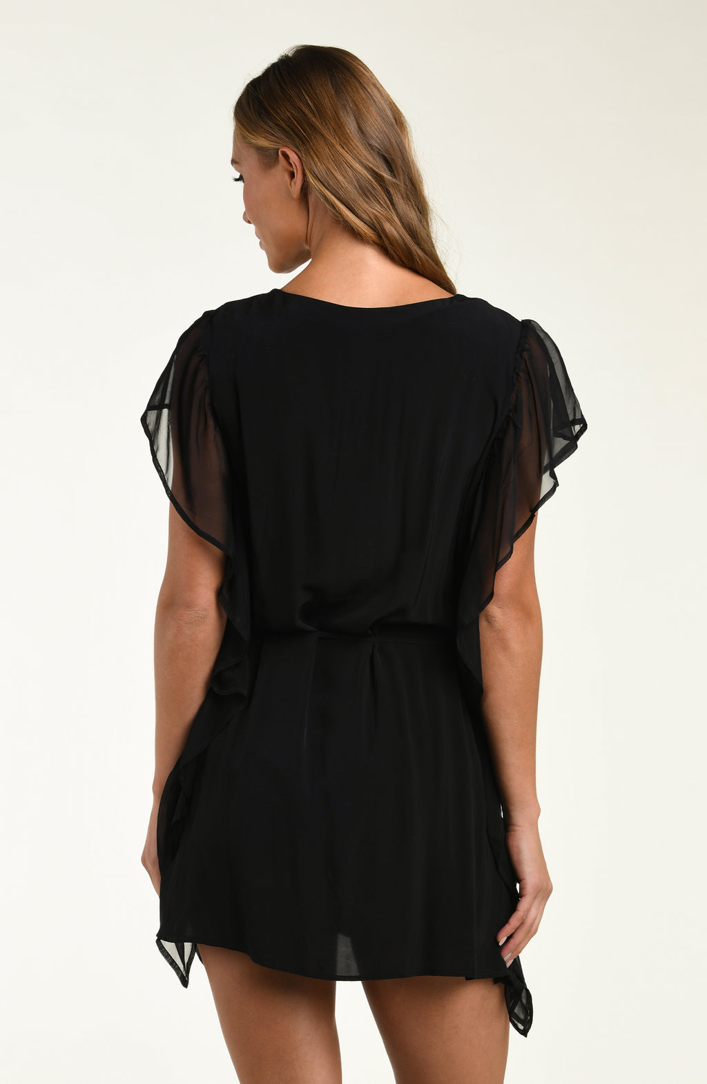 Black dress with sheer sleeves on a white background