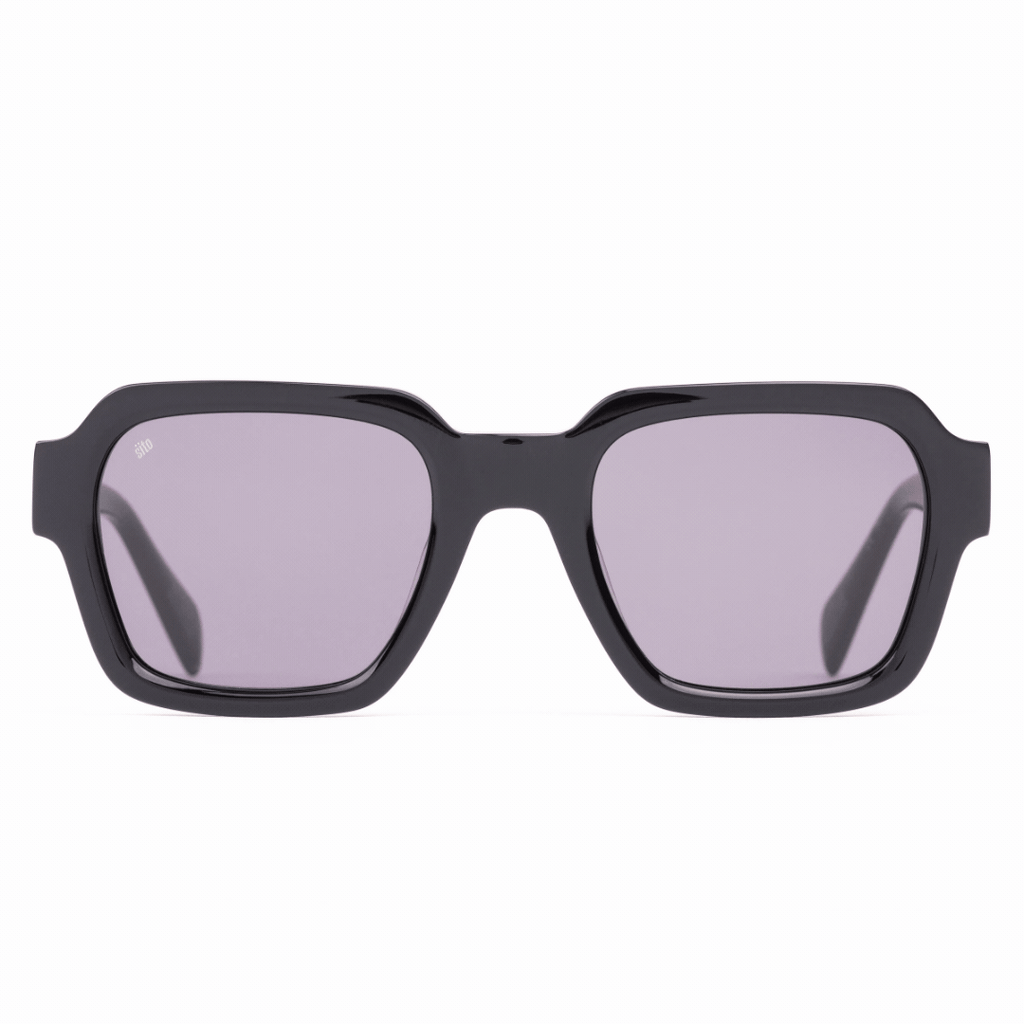 Video of rotating sunglasses of different colors against a white background. 