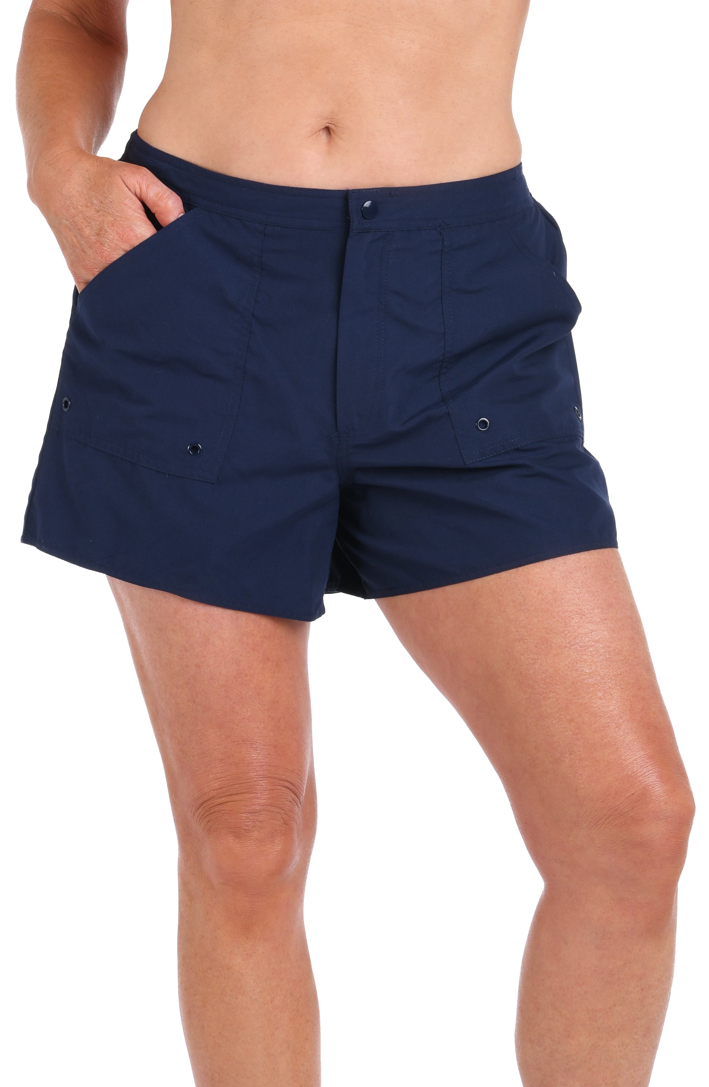 Navy blue shorts worn by a person on a white background