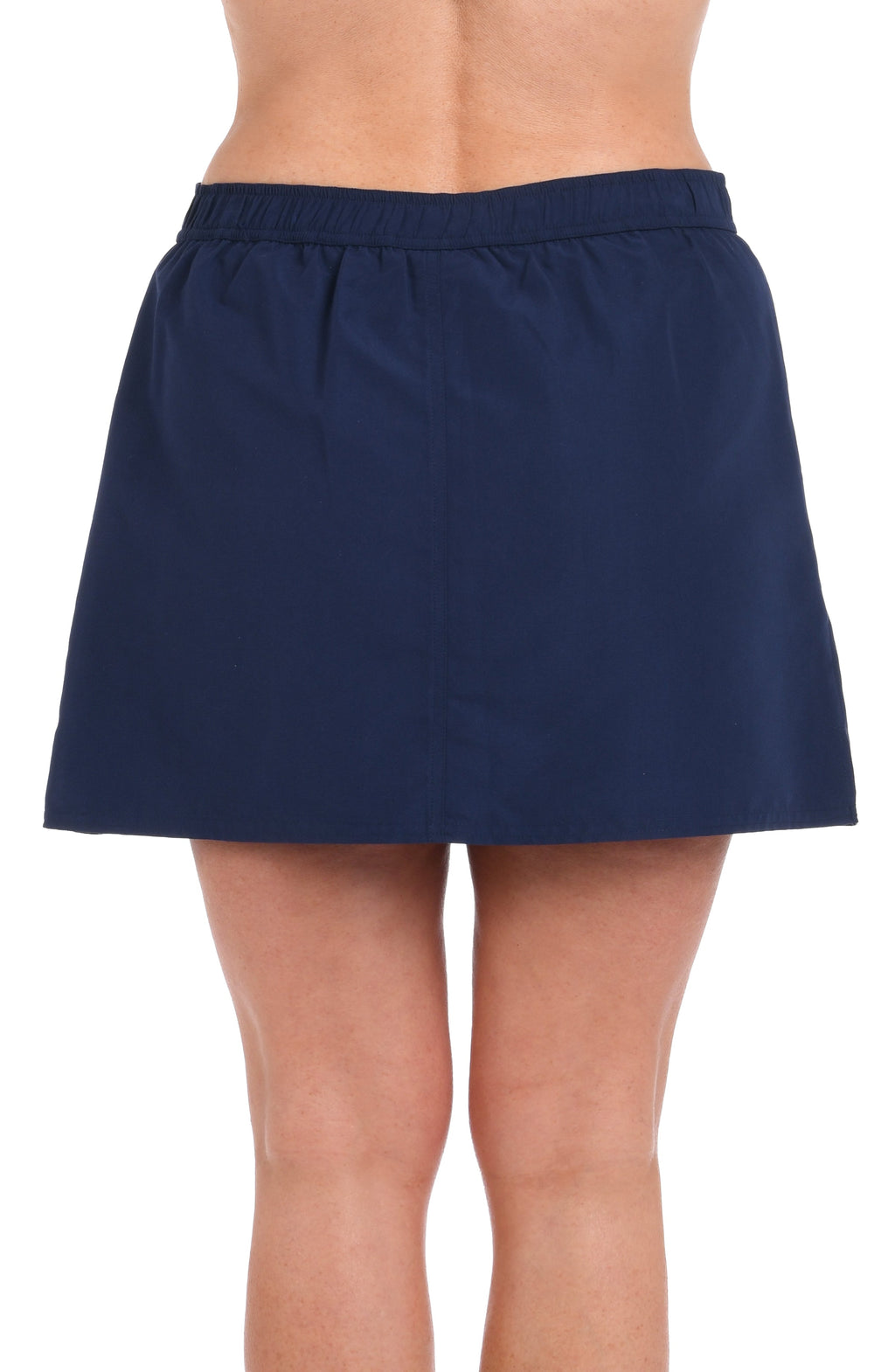 Navy blue swim skirt worn by a person on a white background