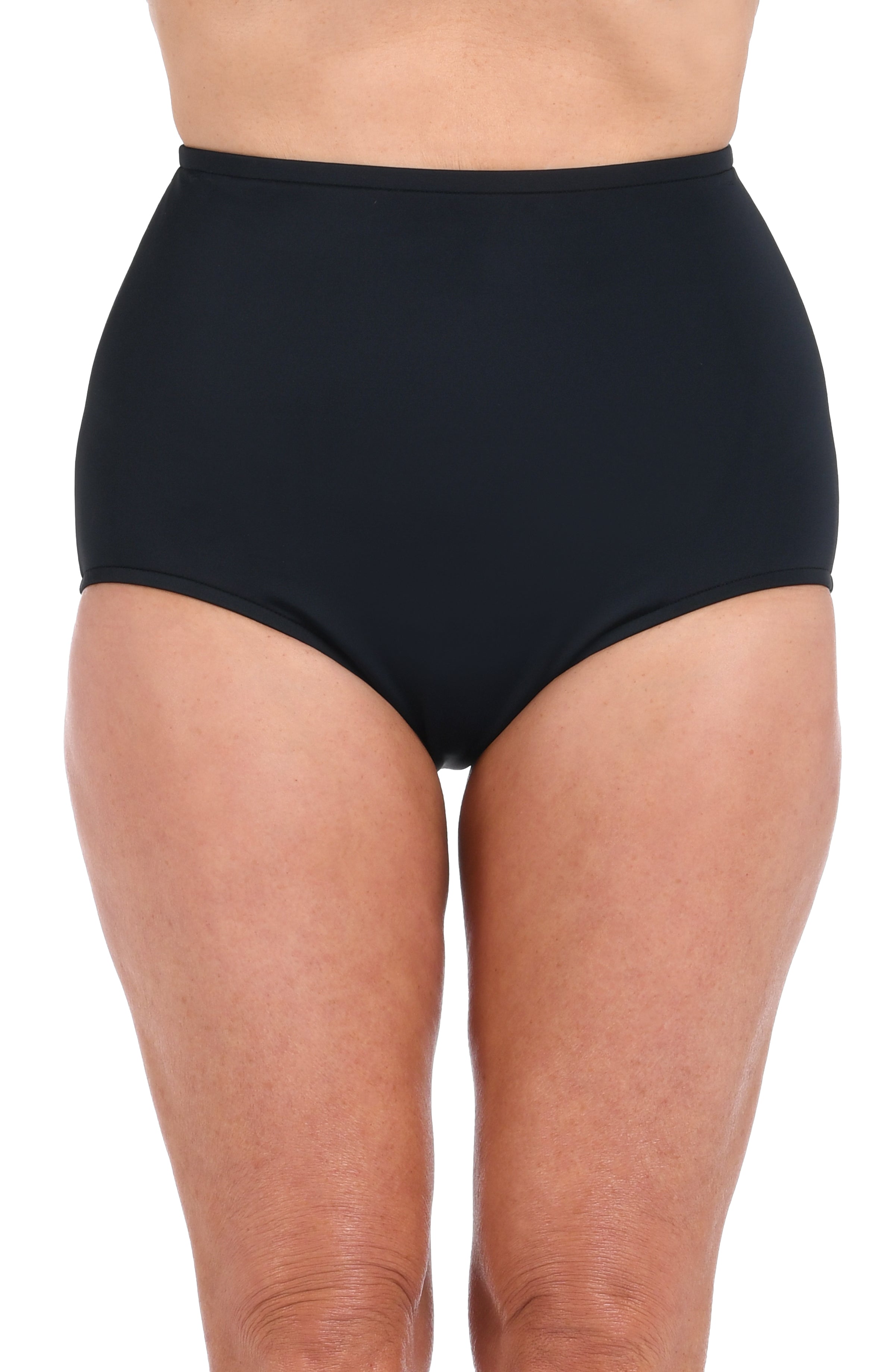 Black high-waisted swim bottoms worn by a person on a white background