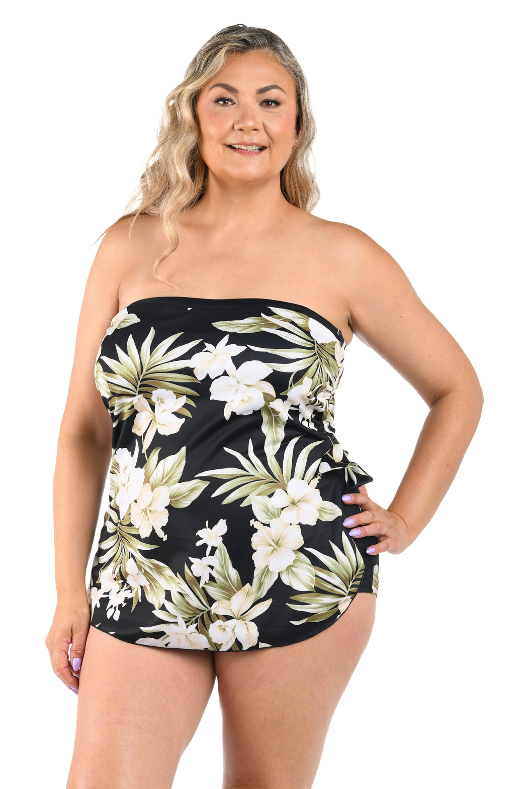 Woman wearing a strapless floral swimsuit on a white background
