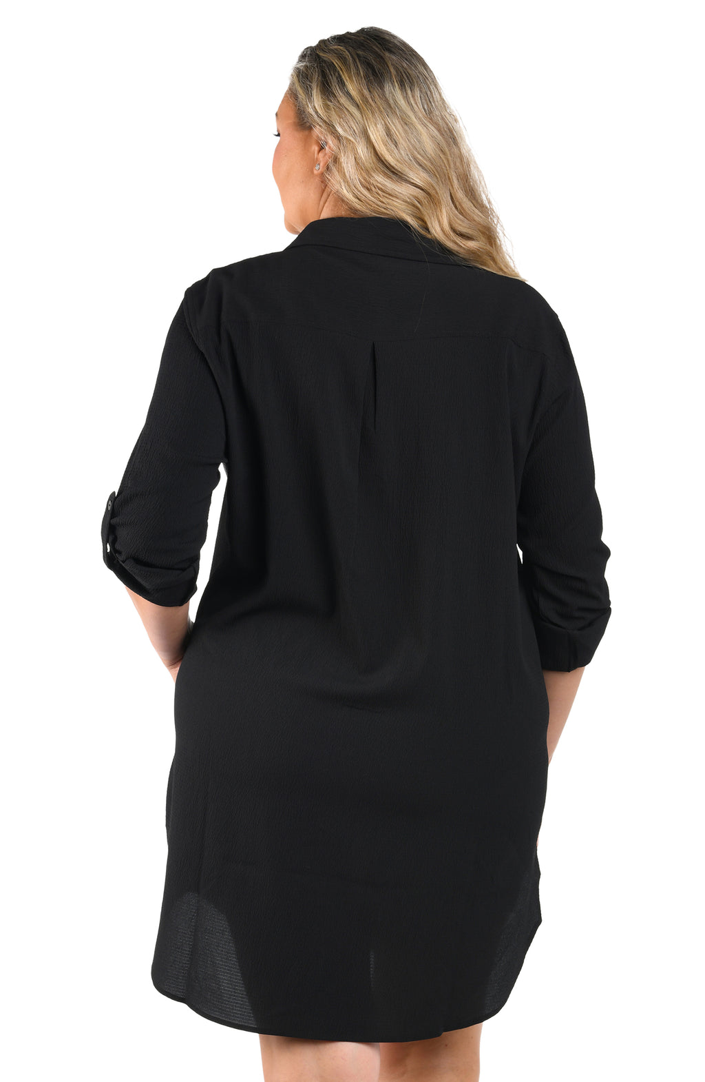 Black dress worn by a person on a white background