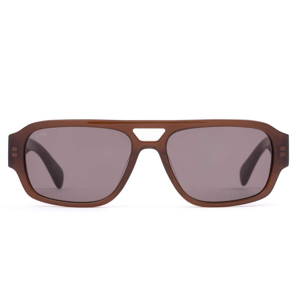 Image of a pair of brown colored sunglasses.