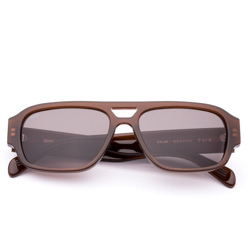 Image of a pair of brown colored sunglasses.