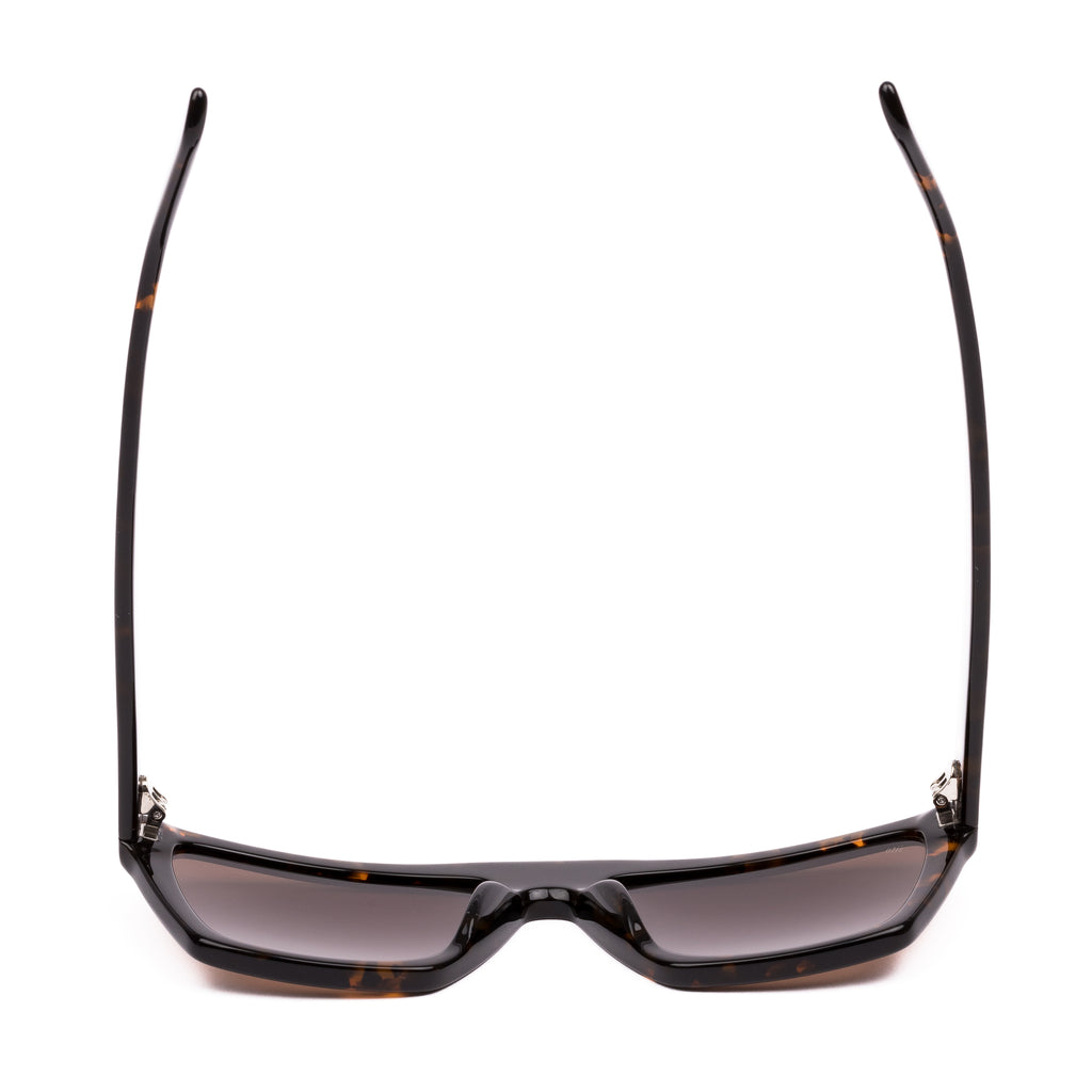 Sunglasses with a tortoiseshell frame on a white background