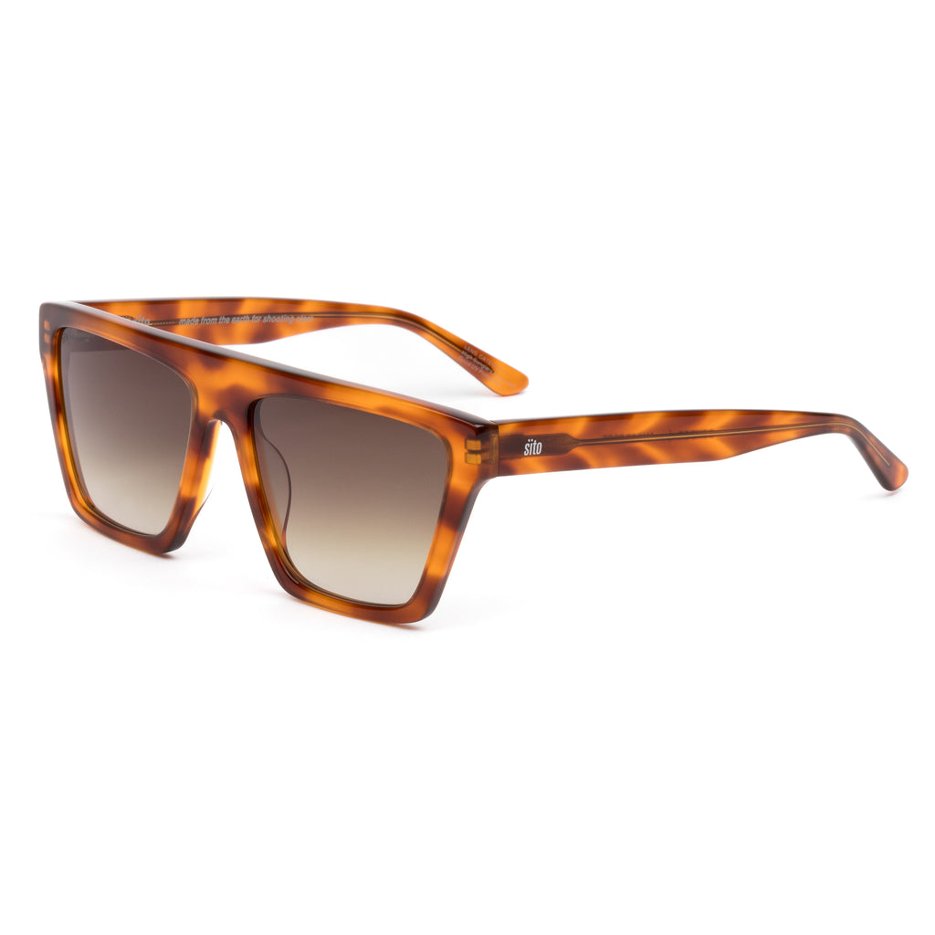 Sunglasses with tortoiseshell frame and gradient lenses on a white background