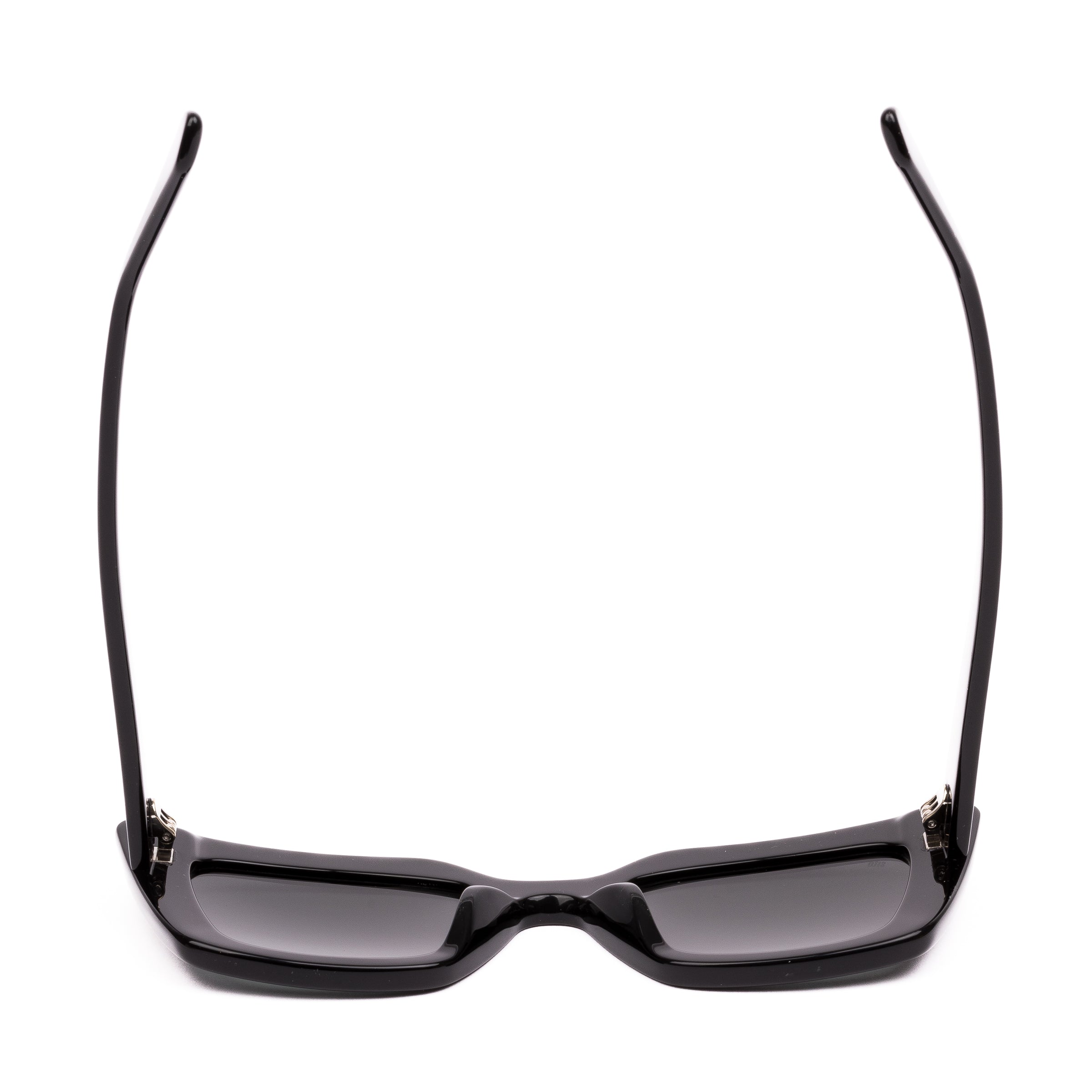 Black sunglasses with dark lenses on a white background