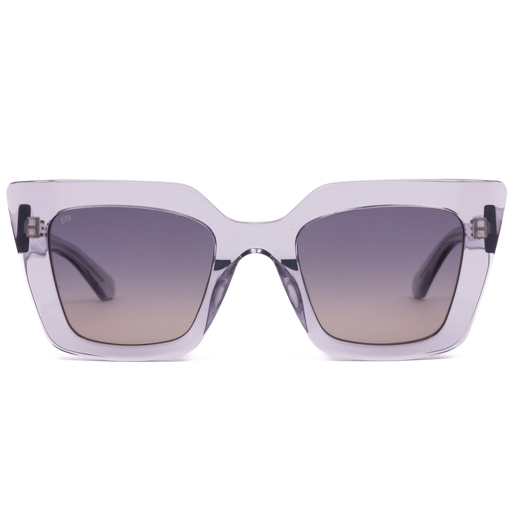 Sunglasses with clear frame and gradient lenses on a white background