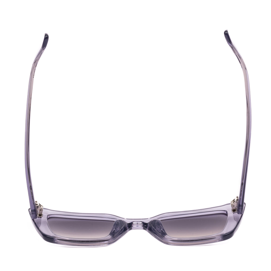 Sunglasses with clear frame and gradient lenses on a white background