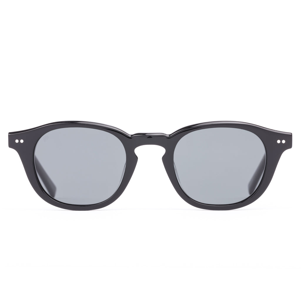 Black sunglasses with reflective lenses on a white background