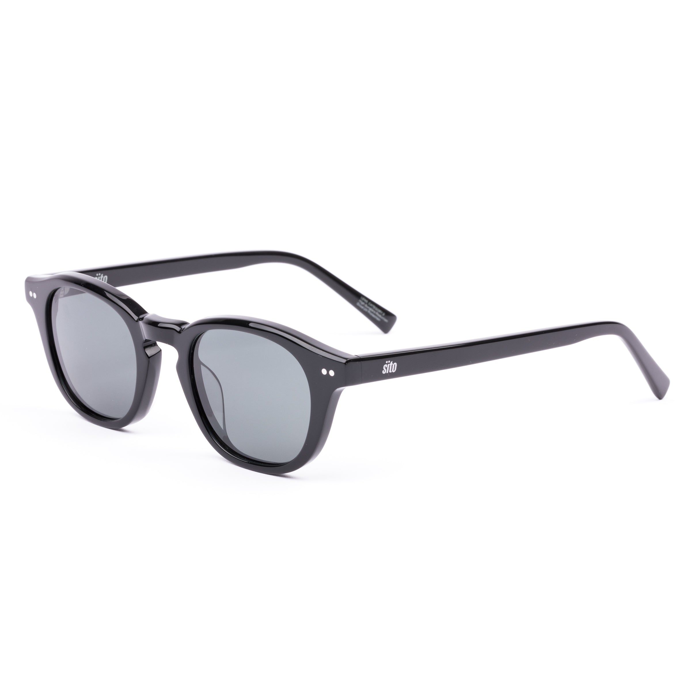 Black sunglasses with reflective lenses on a white background