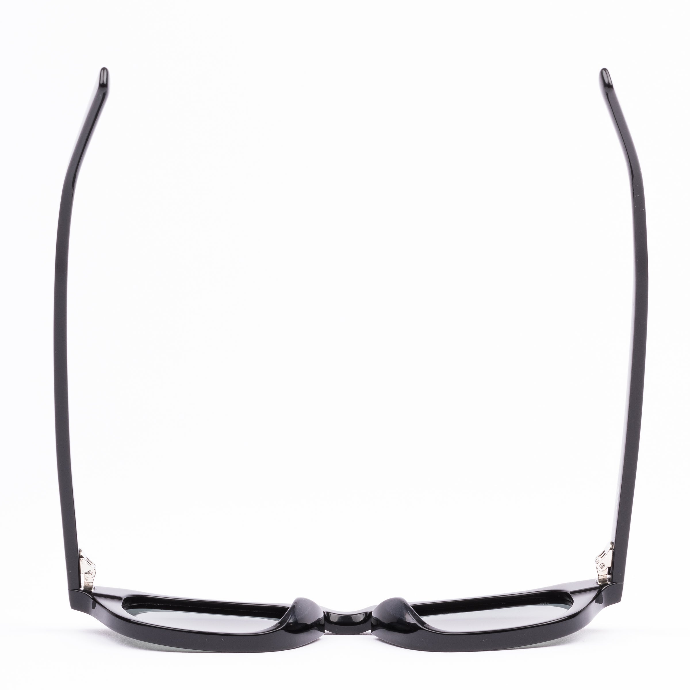 Black sunglasses with reflective lenses on a white background