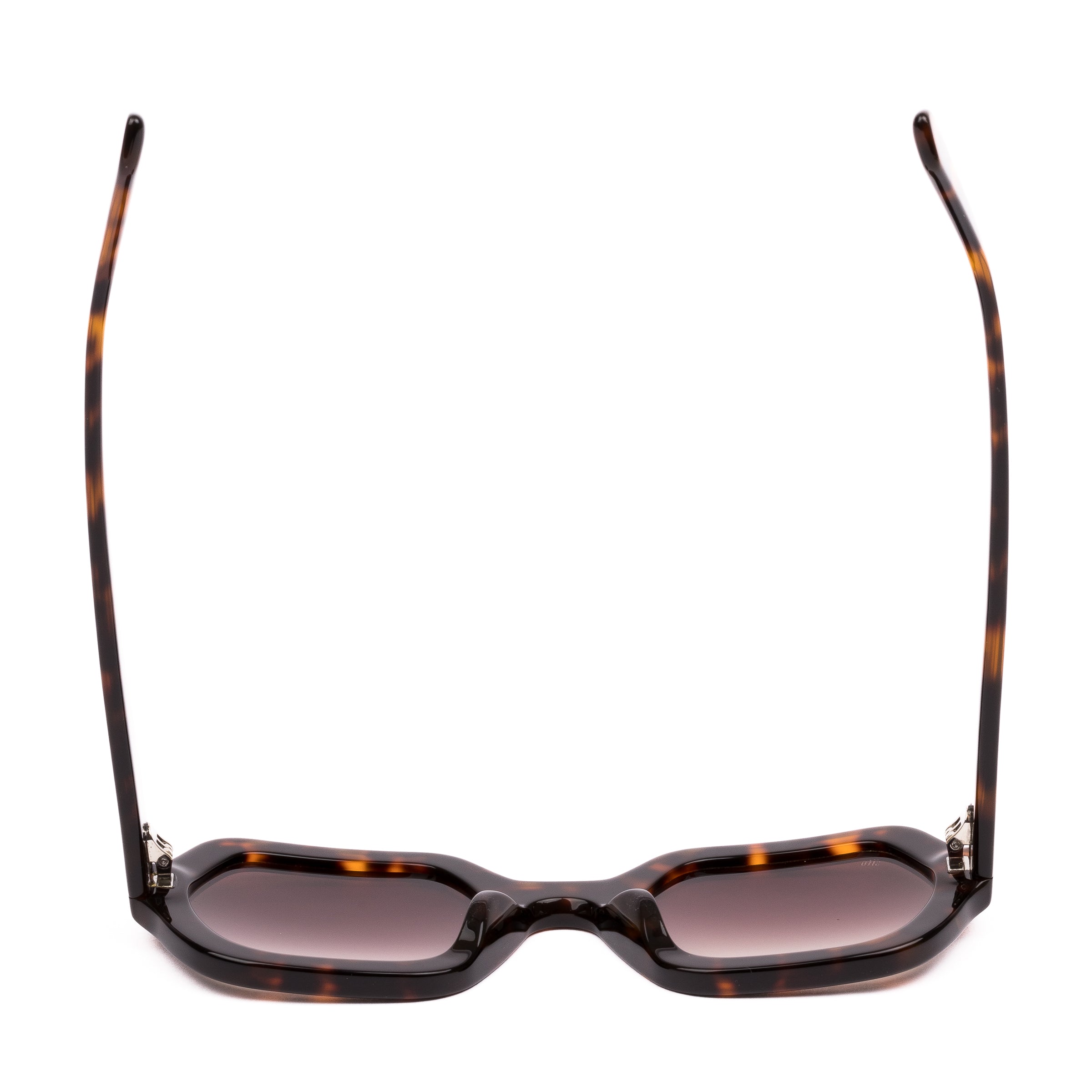 Sunglasses with tortoiseshell frame and gradient lenses on a white background