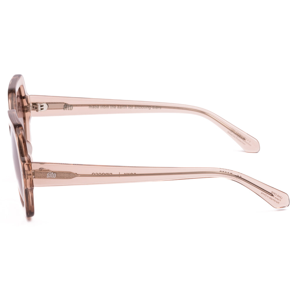 Pink sunglasses with gradient lenses on a white background
