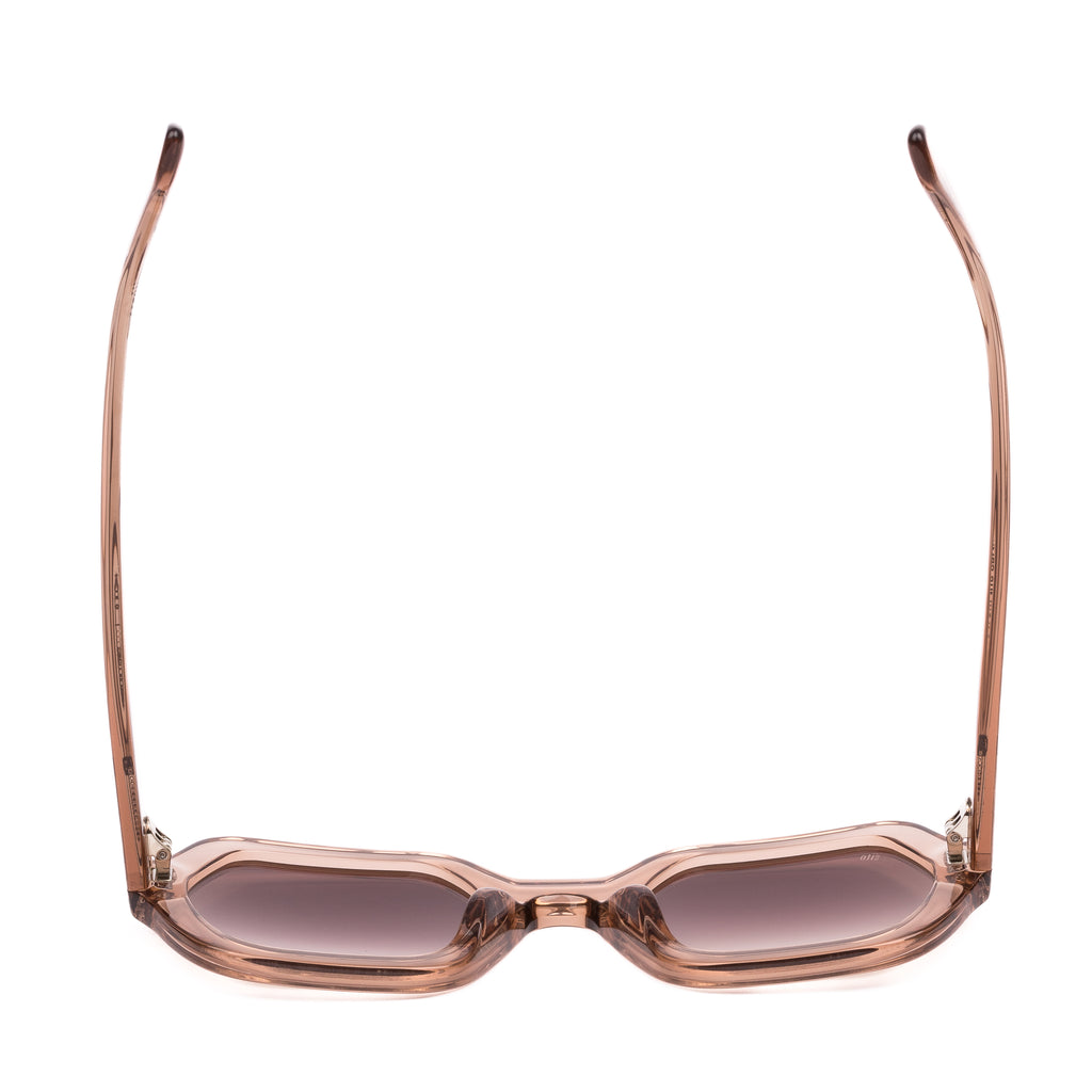 Pink sunglasses with gradient lenses on a white background
