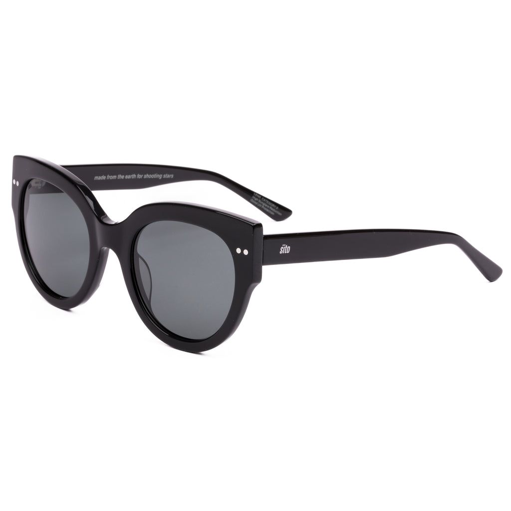Black sunglasses with dark lenses on a white background